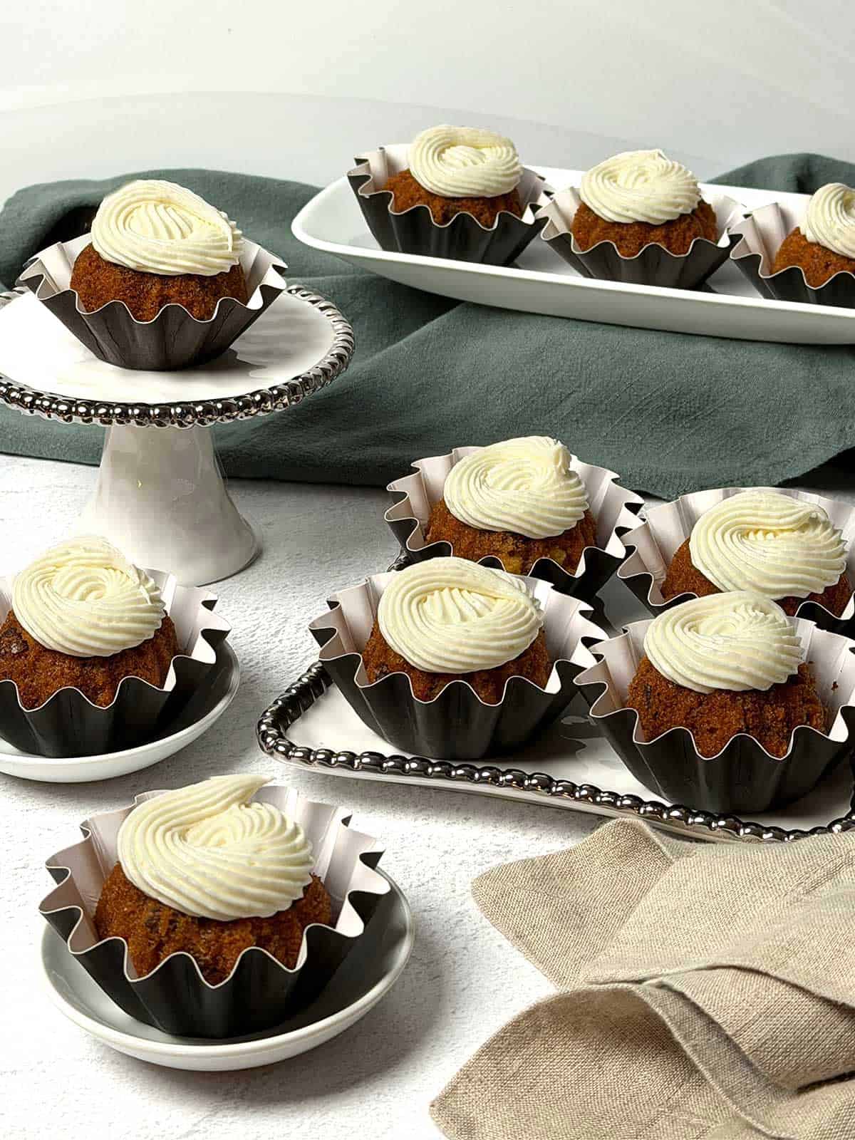 Mini carrot bundt cakes with cream cheese frosting.