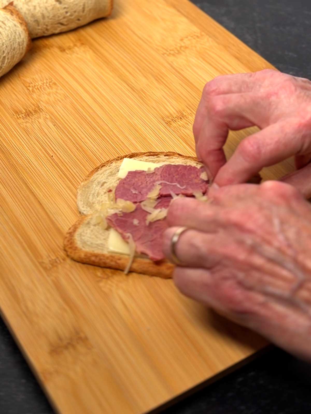 Rolling the Reuben rollup.