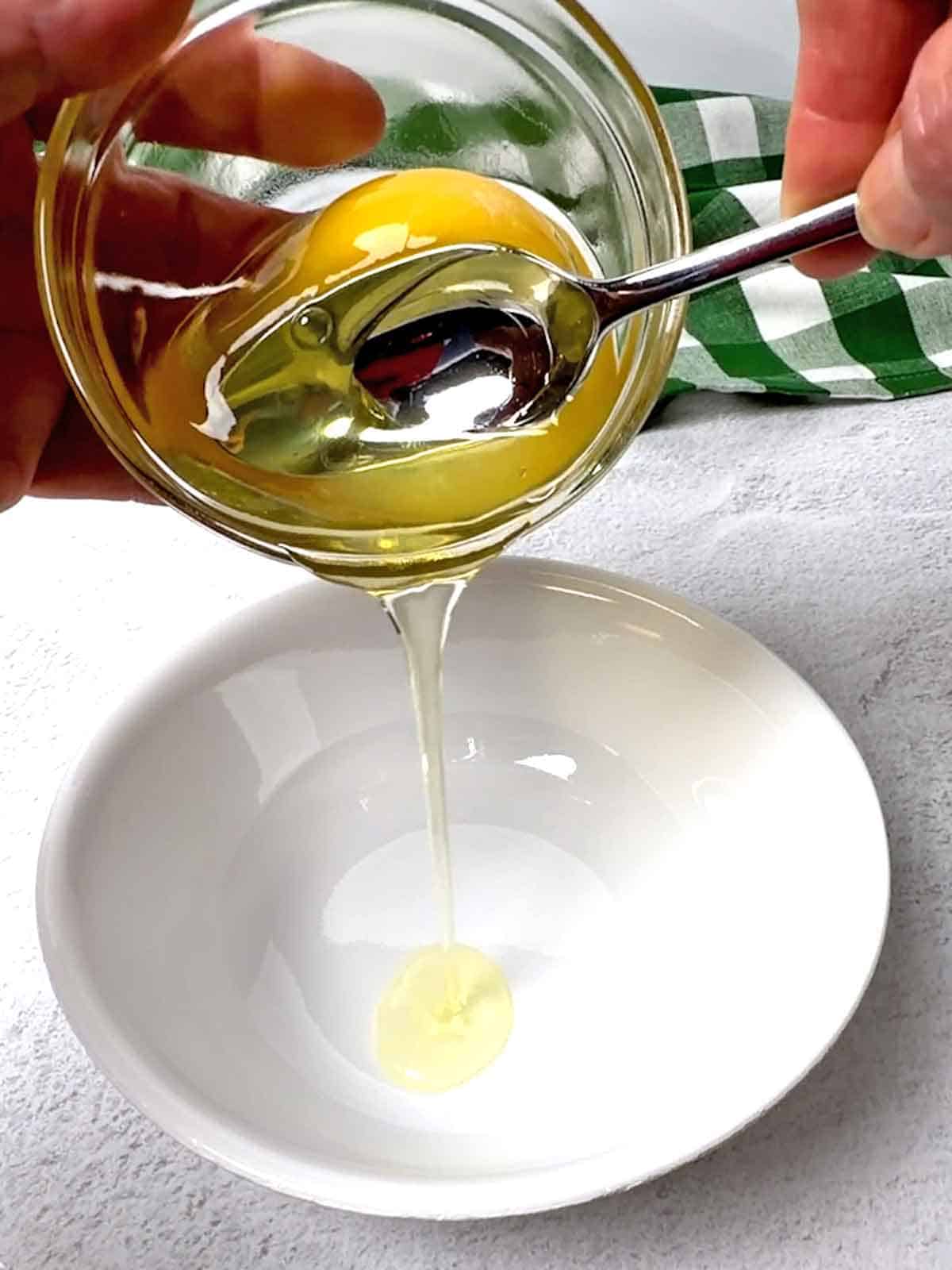 Draining the water liquic from the egg.