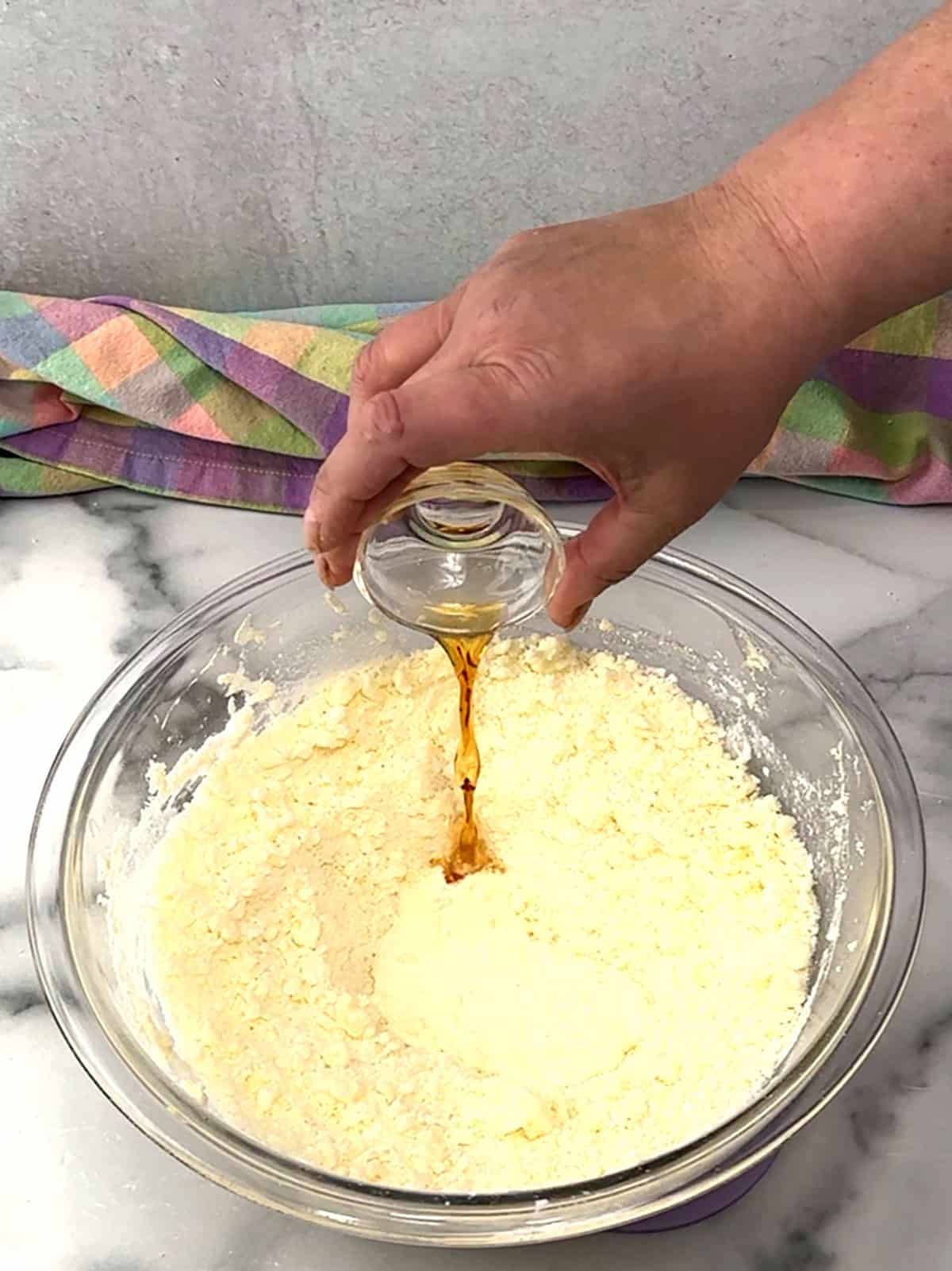 adding vanilla and heavy whipping cream for frosting