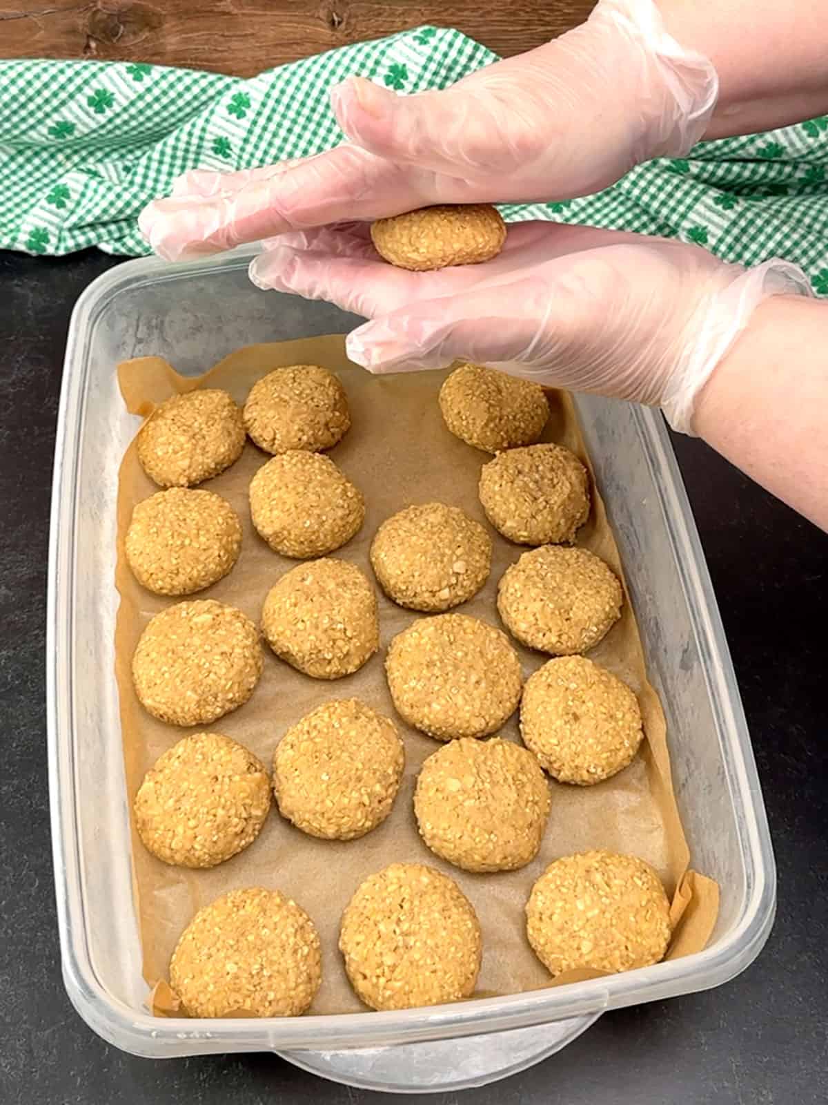 flattening dough into disks and placing in freezer proof container