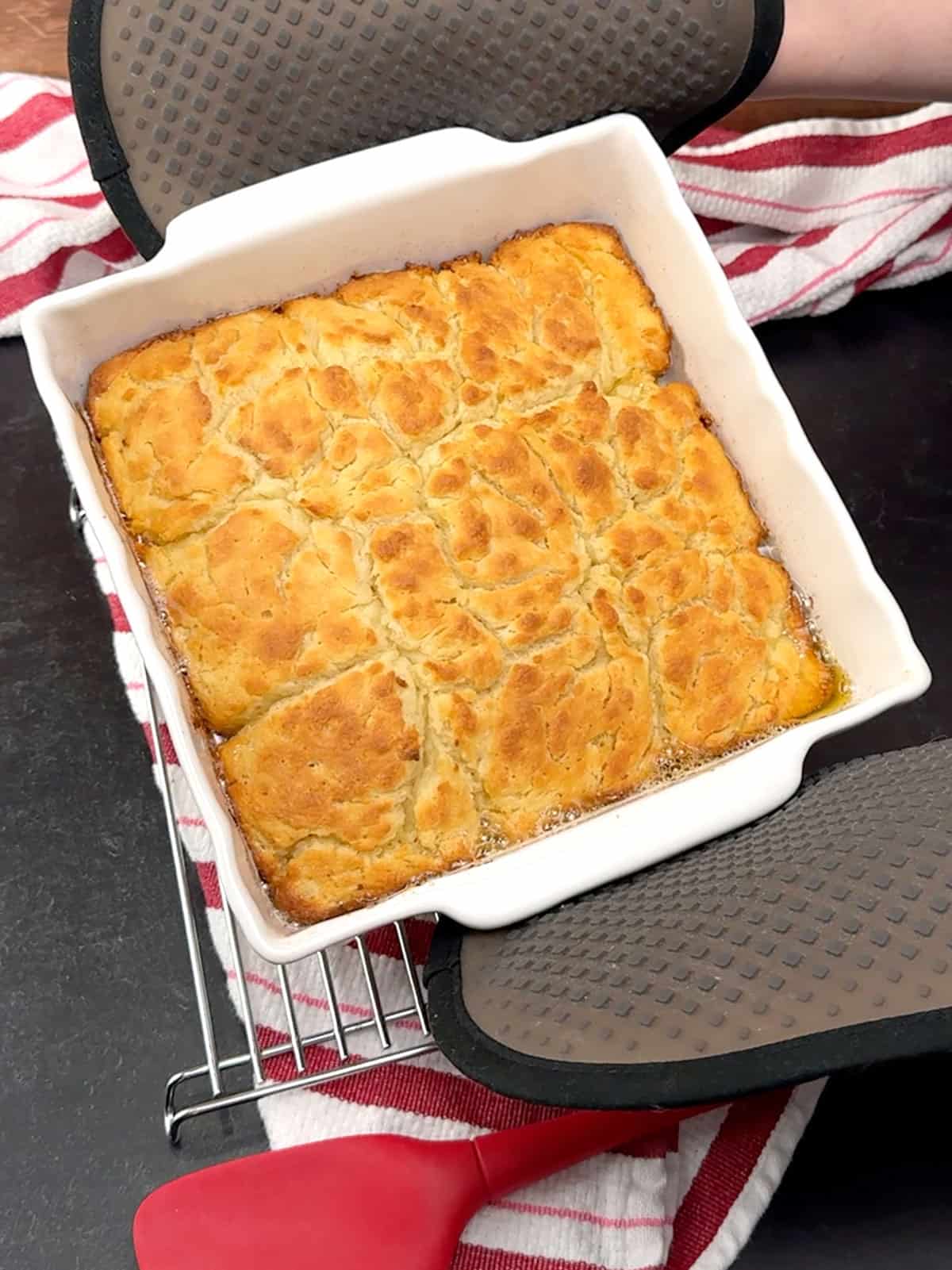 removing easy butter swim biscuits from the oven