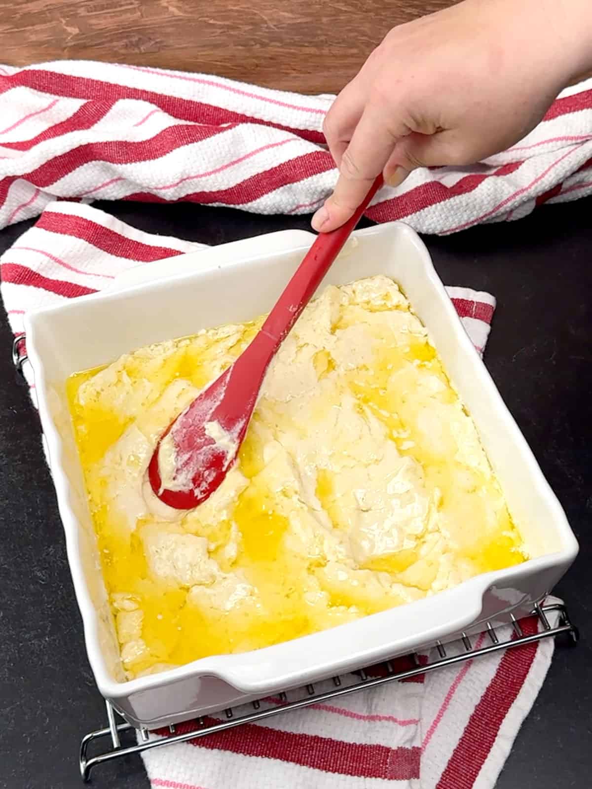spreading dough in pan