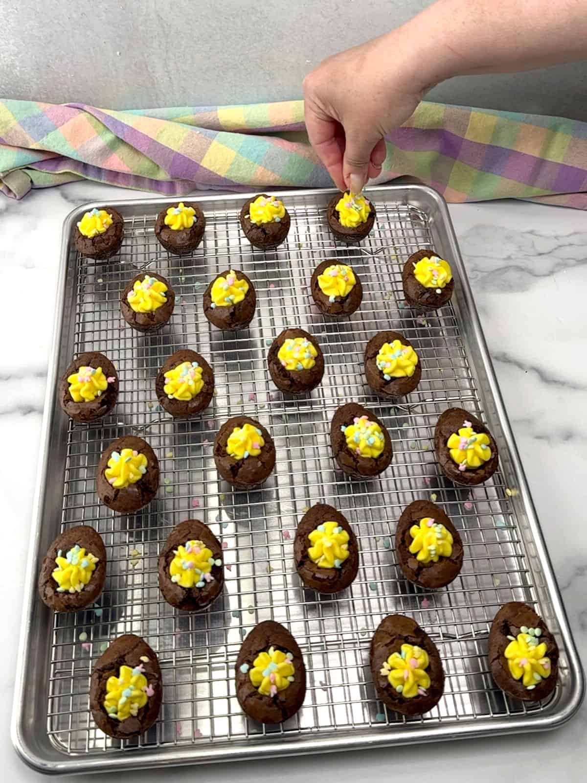 topping eggs with sprinkles