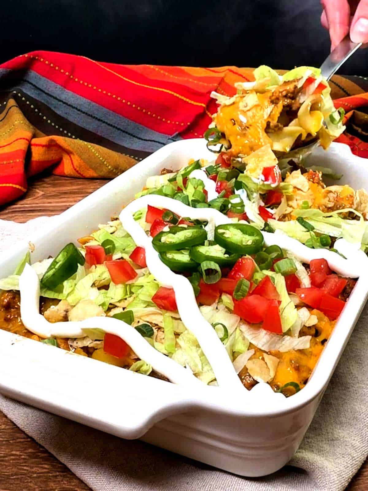 Serving the taco noodle casserole.