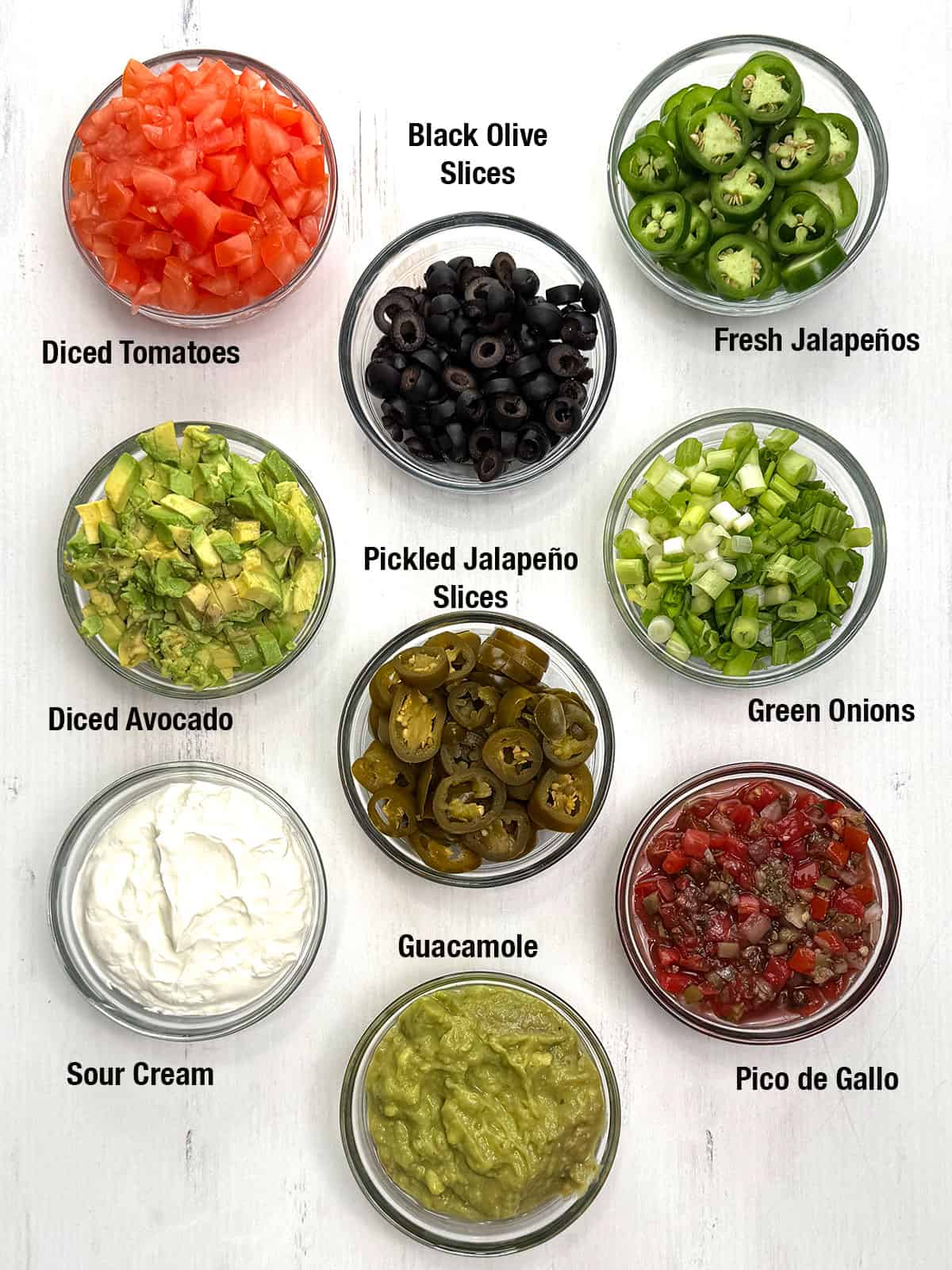 toppings for Ultimate Spicy Chicken & Black Bean Nachos