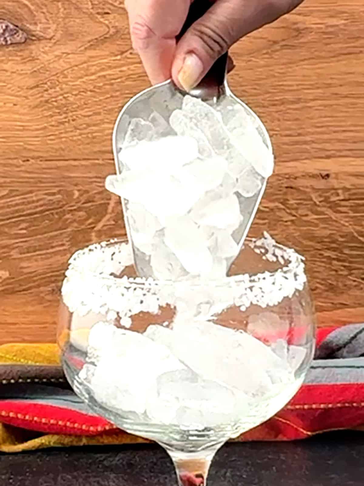 adding ice to salted glass