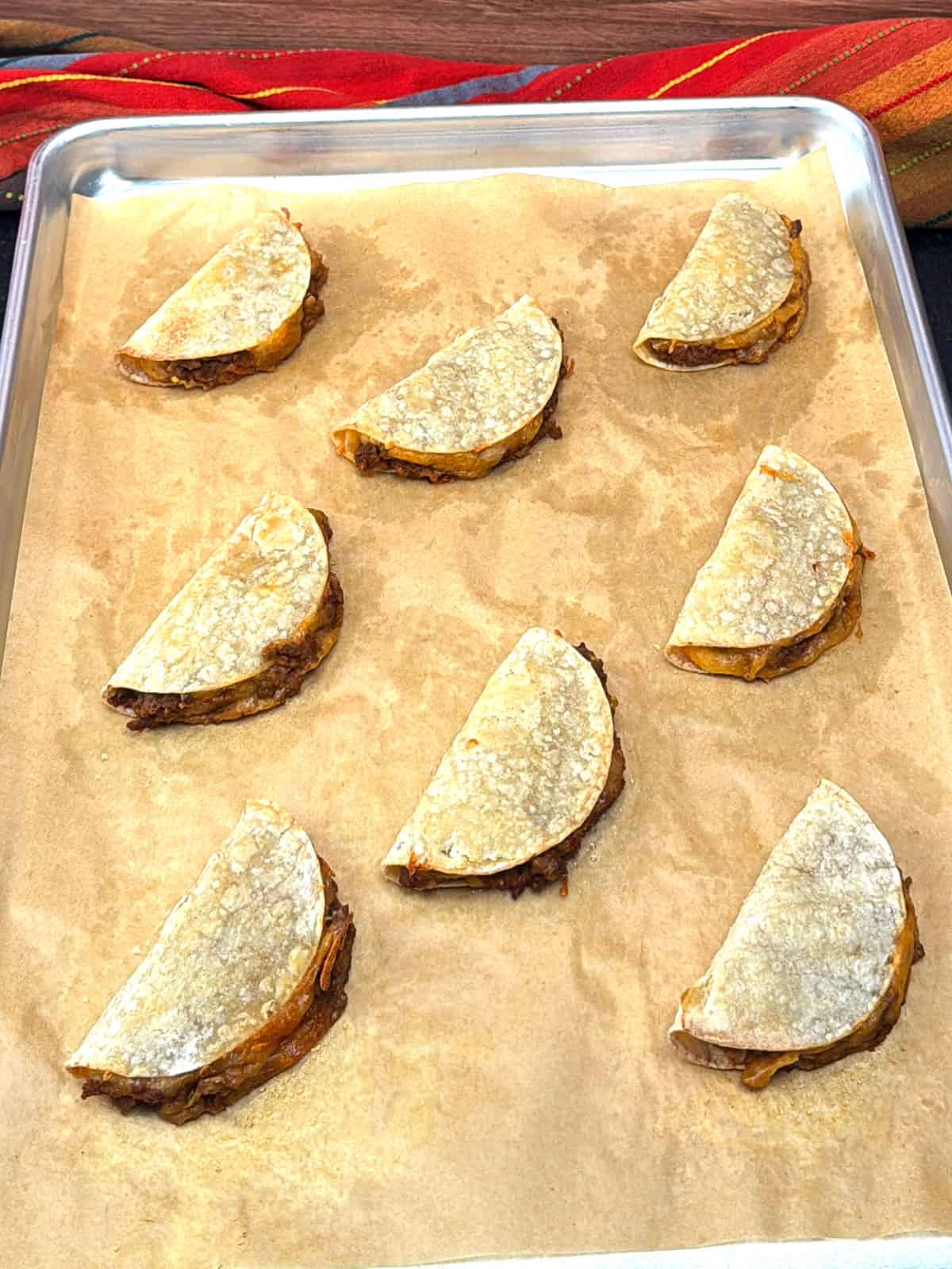 removing tacos from the oven