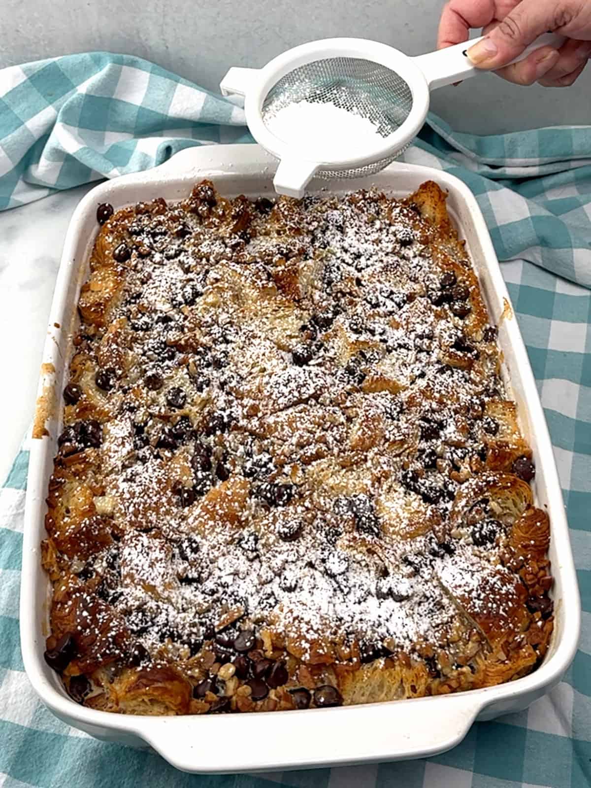 sifting powdered sugar on top