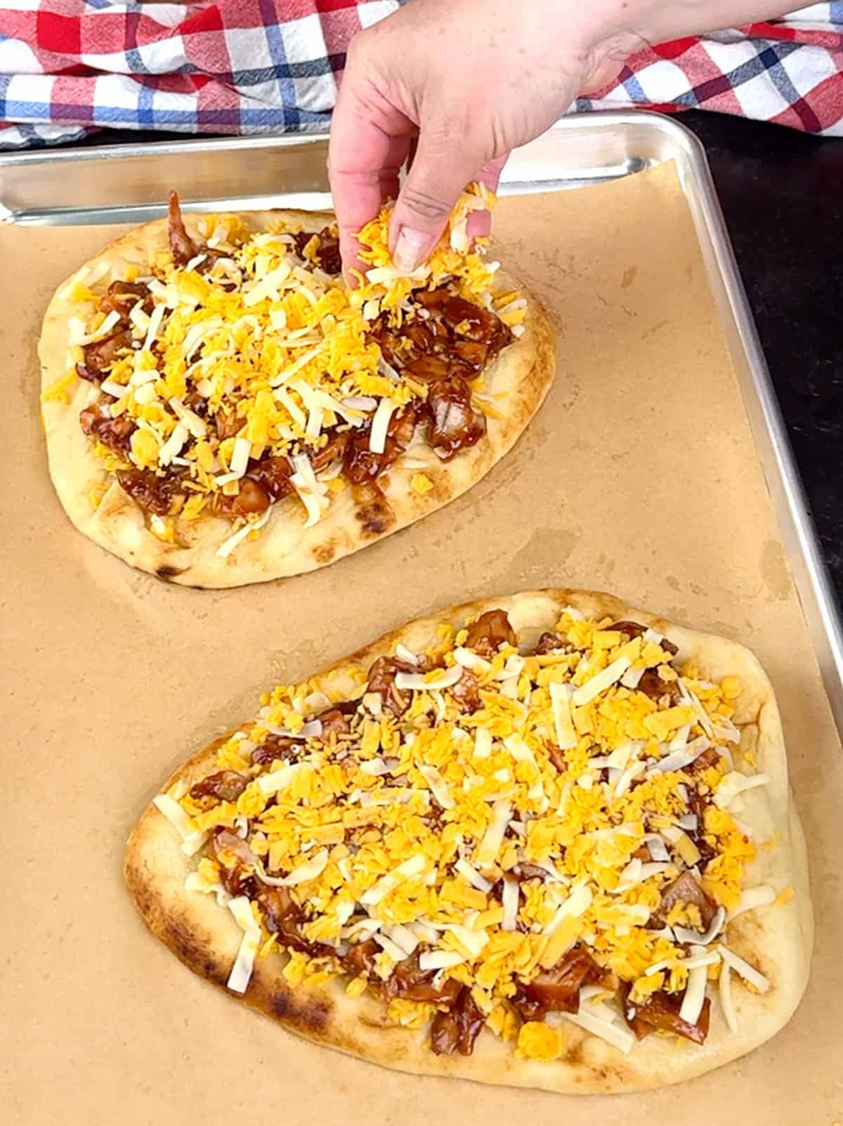 topping with second layer of cheese