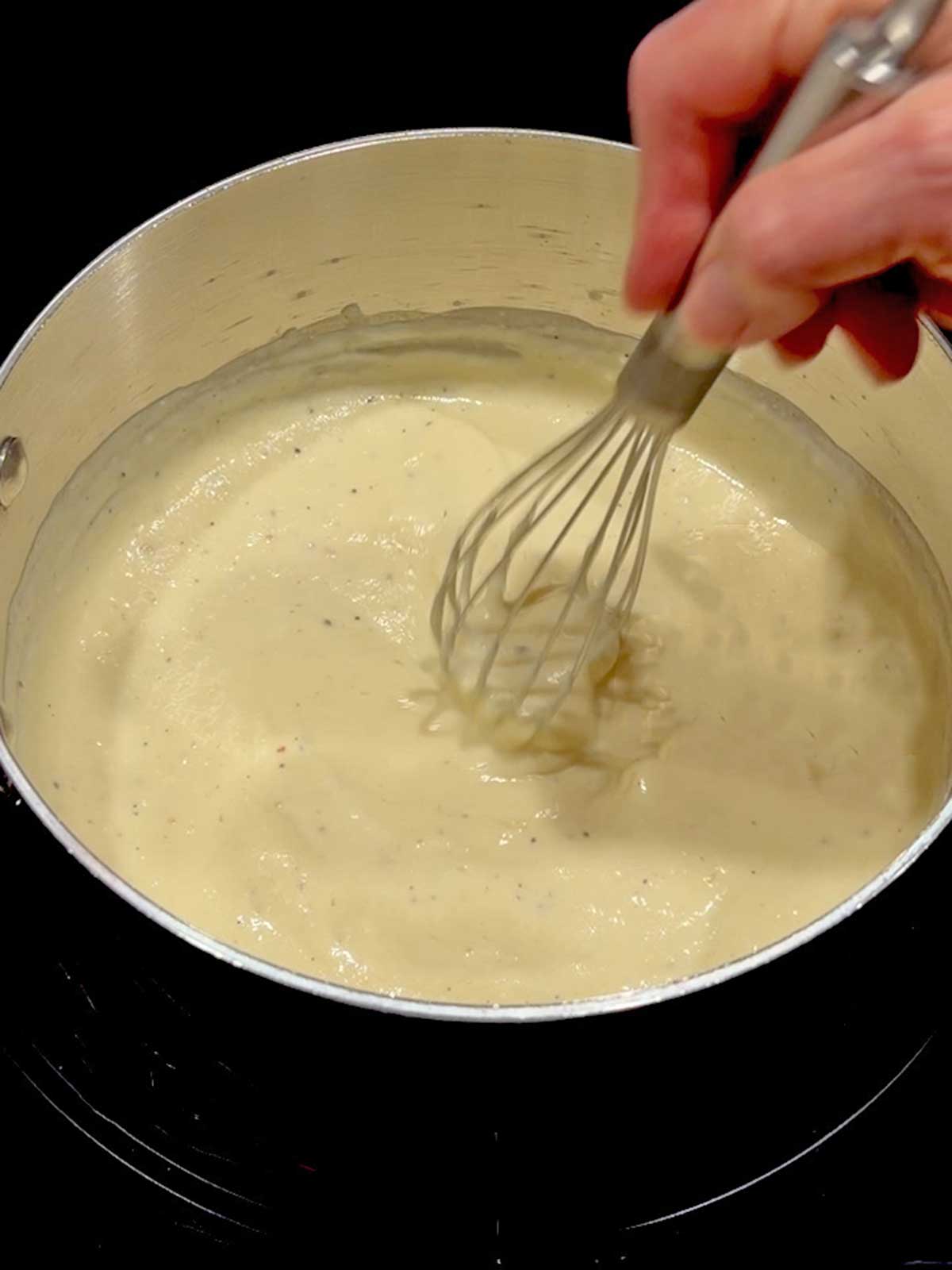 Making the sauce for the chicken divan.