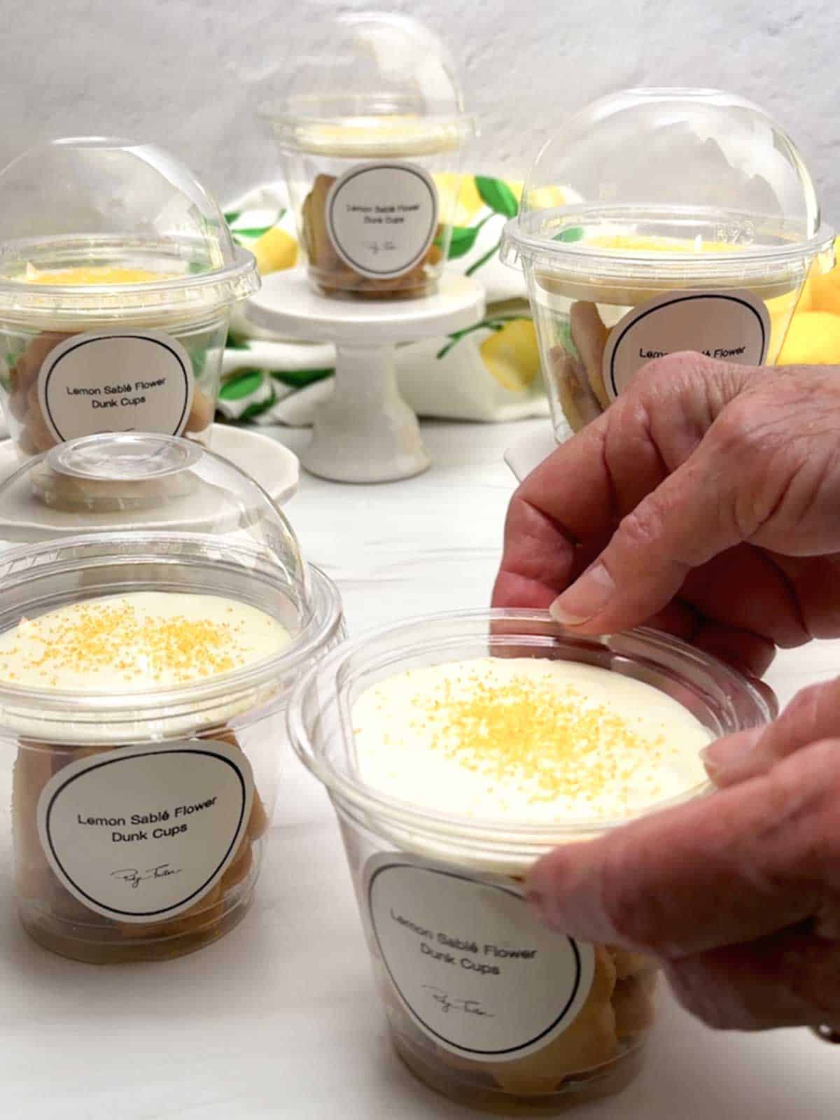 Placing insert on the cup.