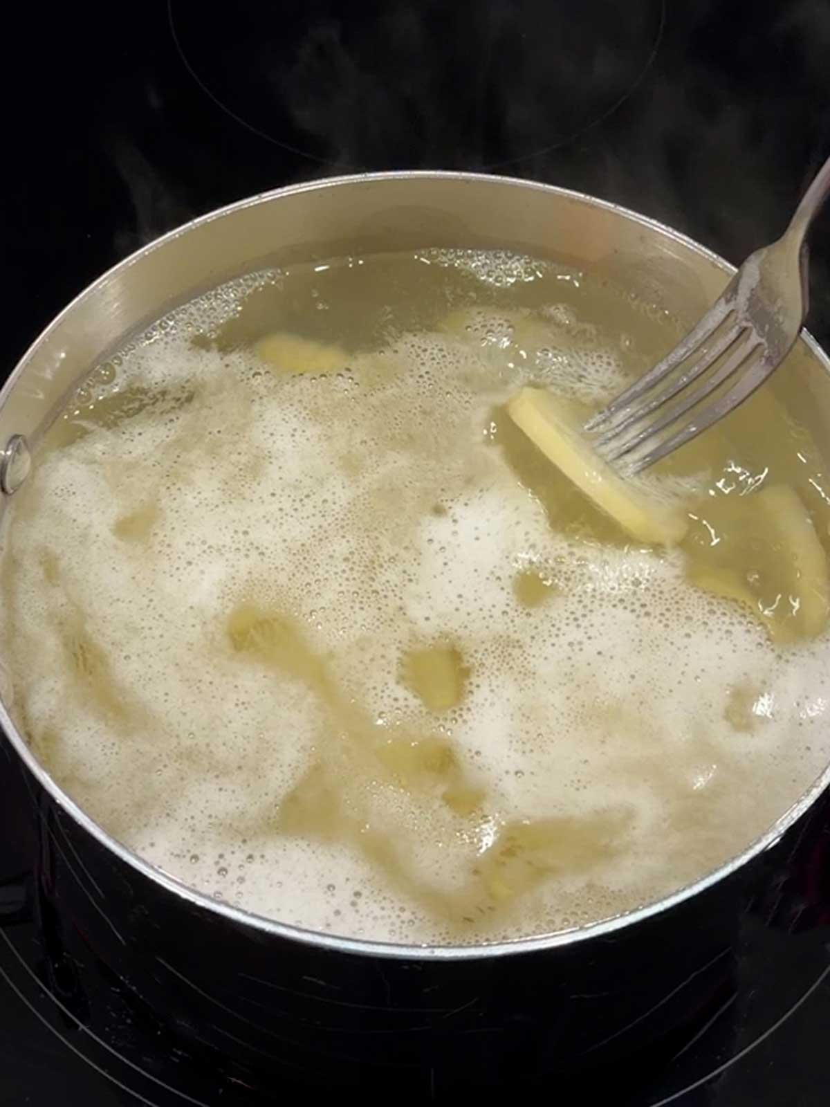Testing the potatoes.