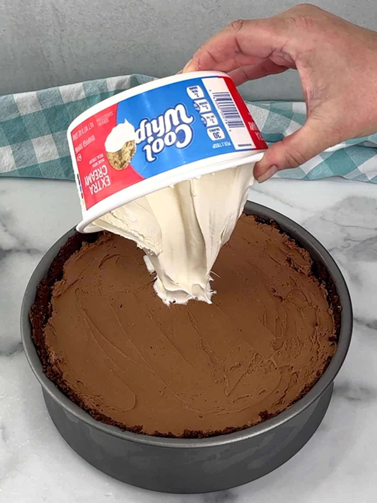 Cool Whip on top of cheesecake filling