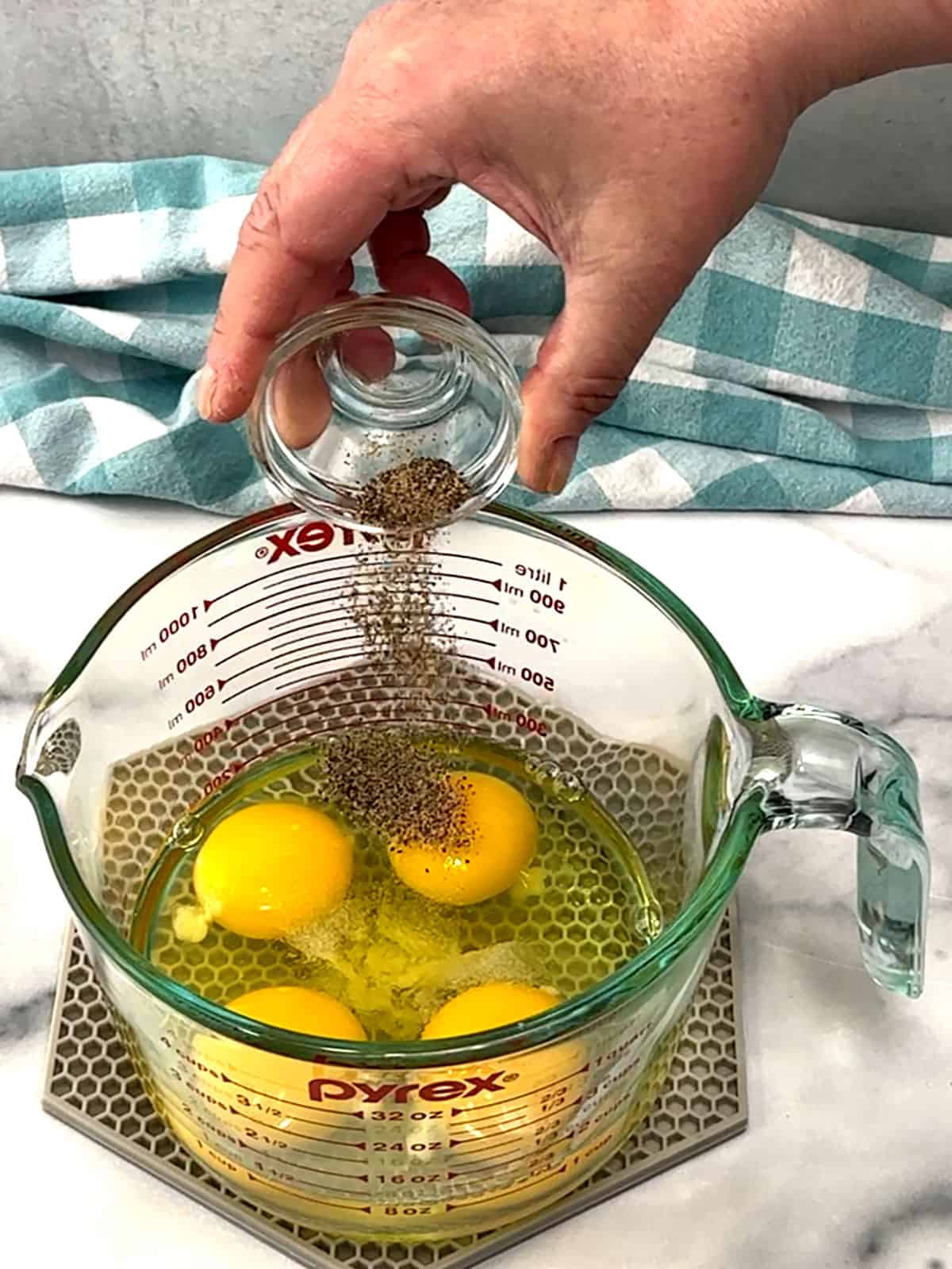 whisking eggs, salt and pepper