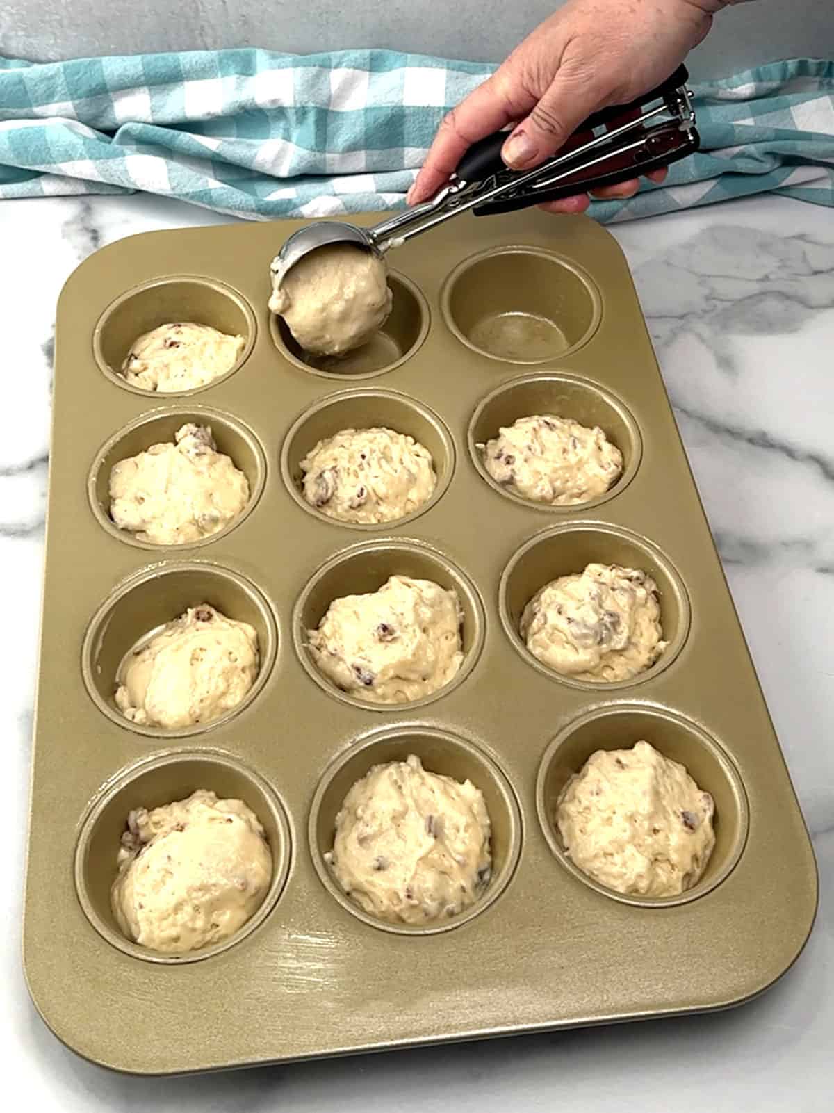 filling pan with batter