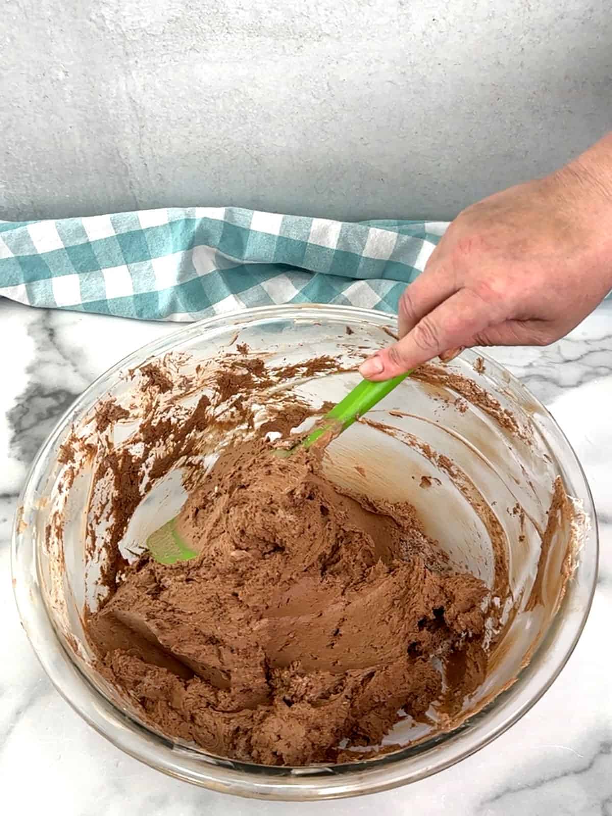 folding cool whip into cheesecake filling