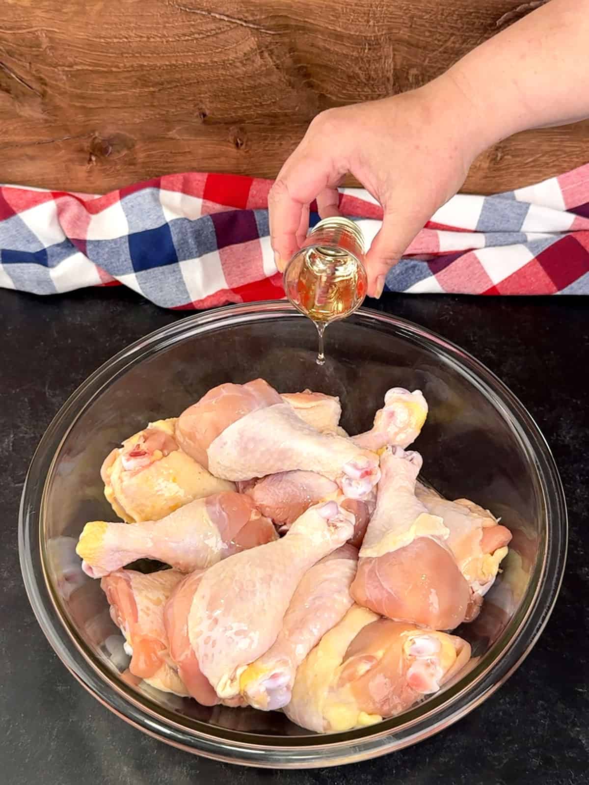 coating the chicken pieces in olive oil