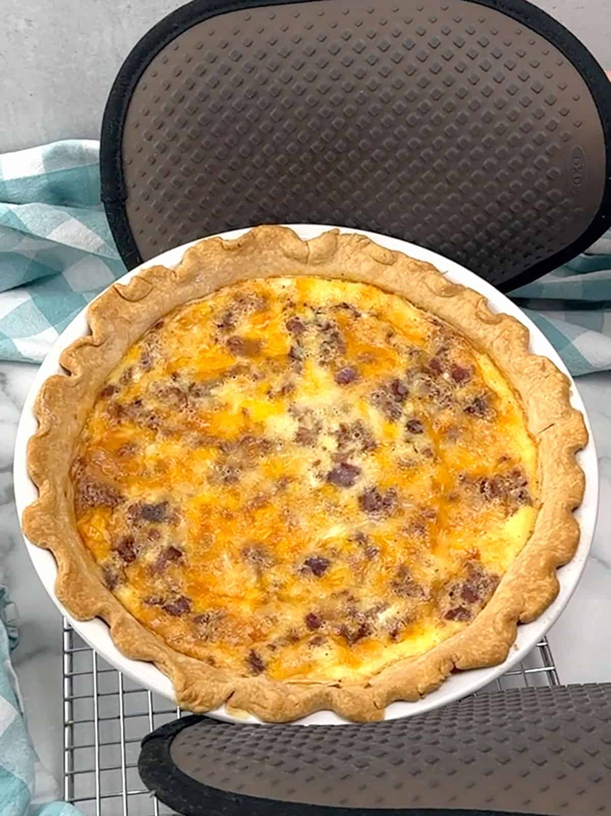 removing quiche from the oven
