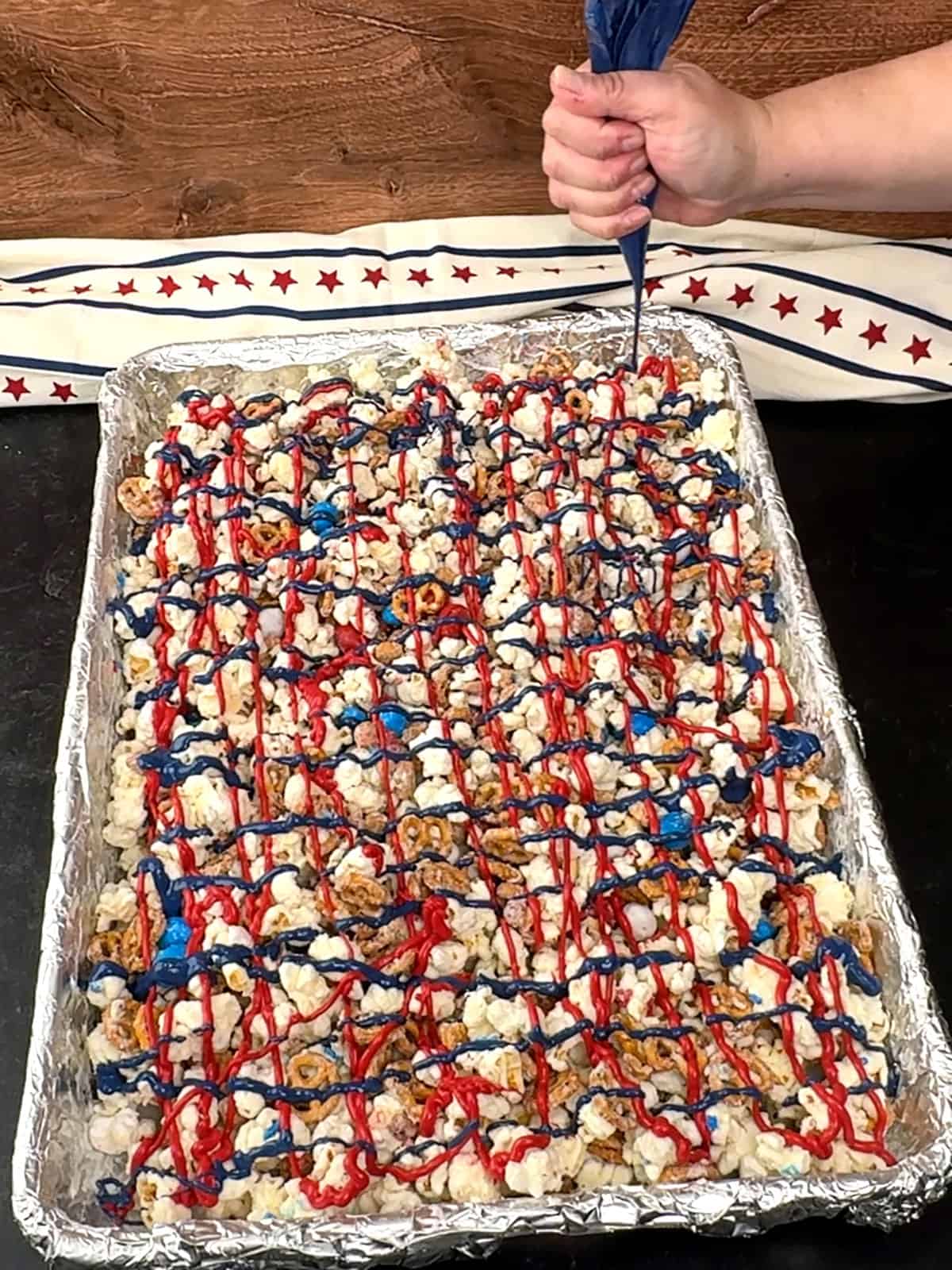 second drizzle of red and blue candy melts