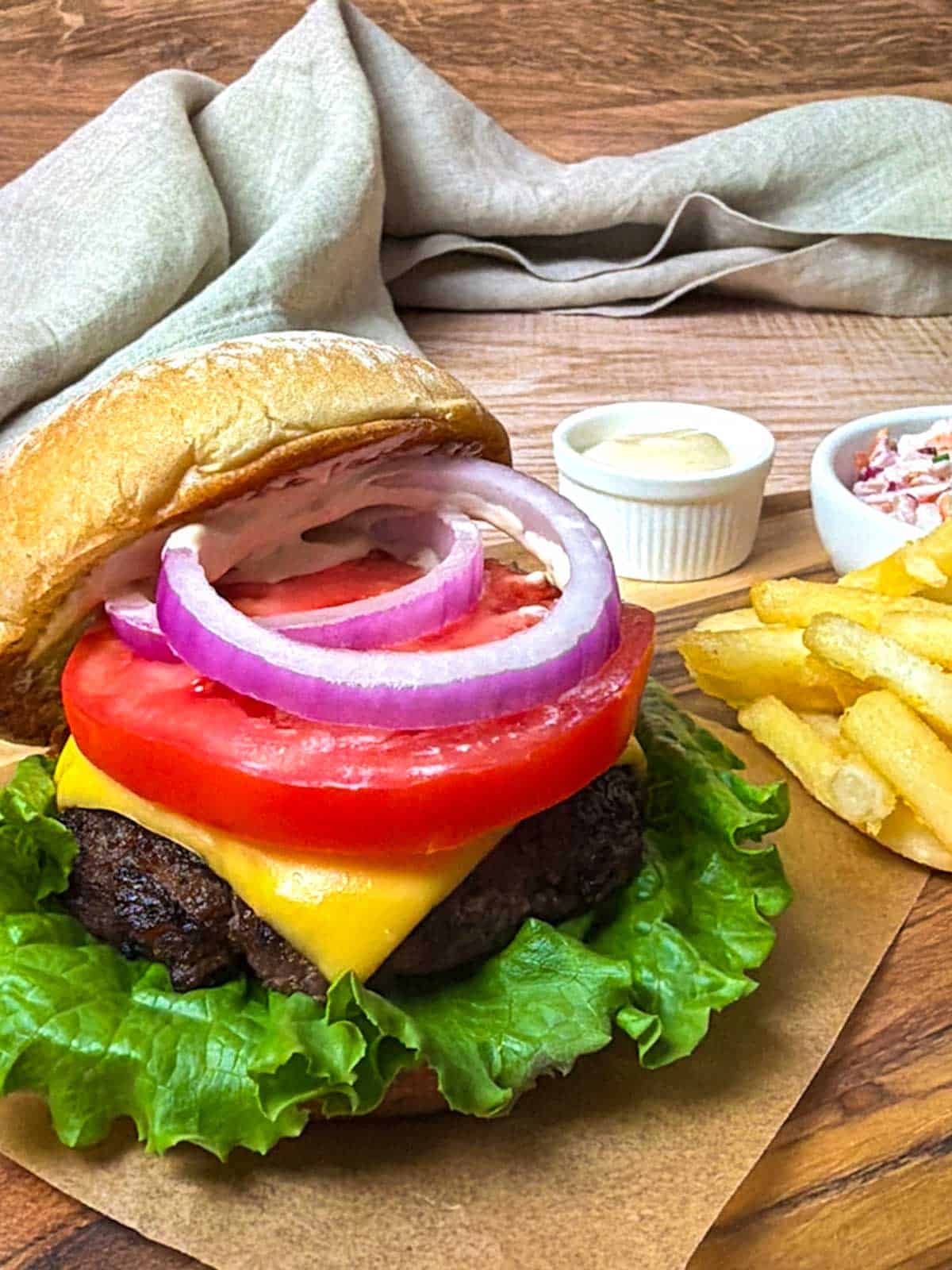 Bistro burger with fries, coleslaw, and Dijon Aioli.