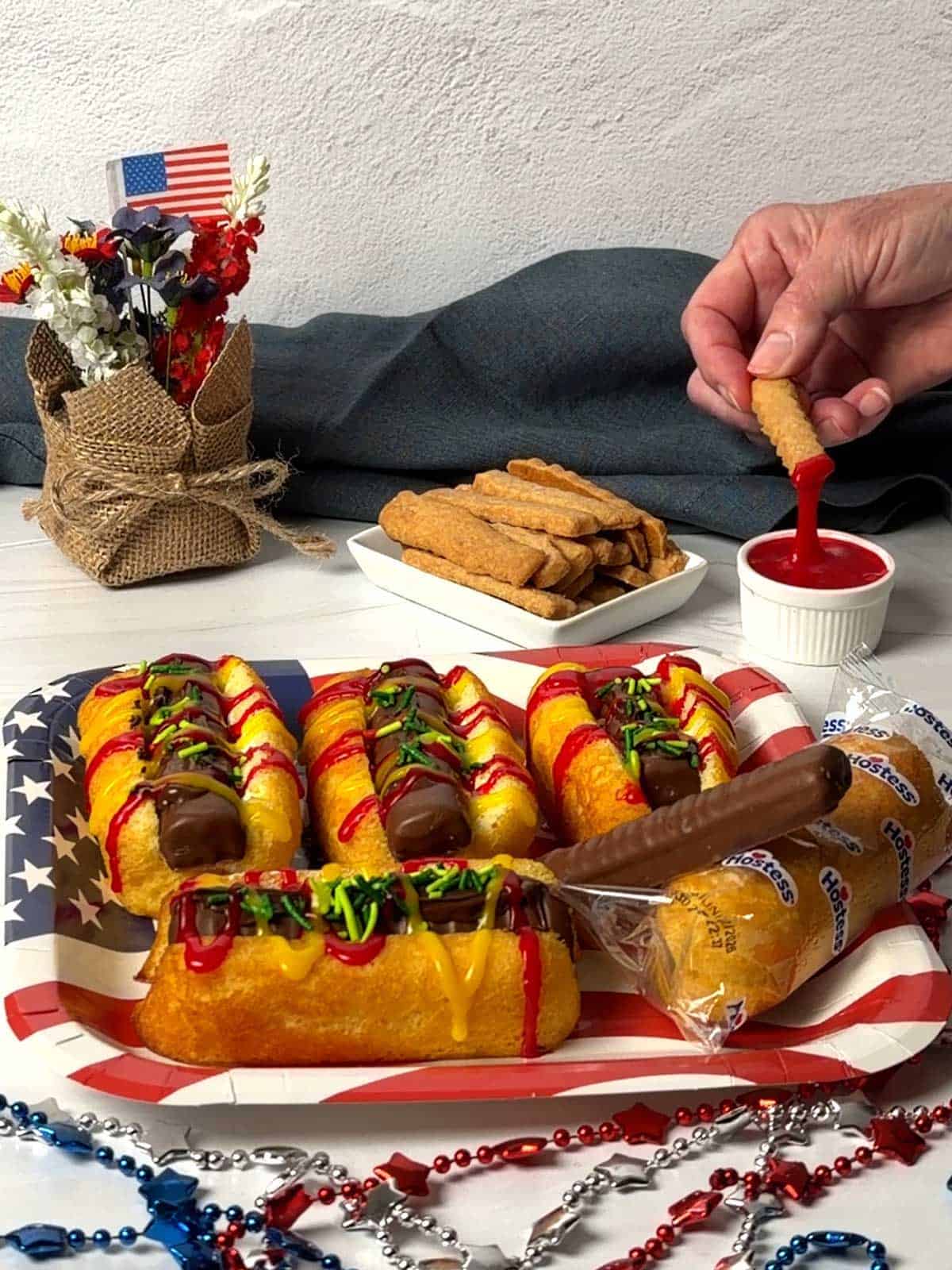 Dipping Cookie Fry in decorating icing.