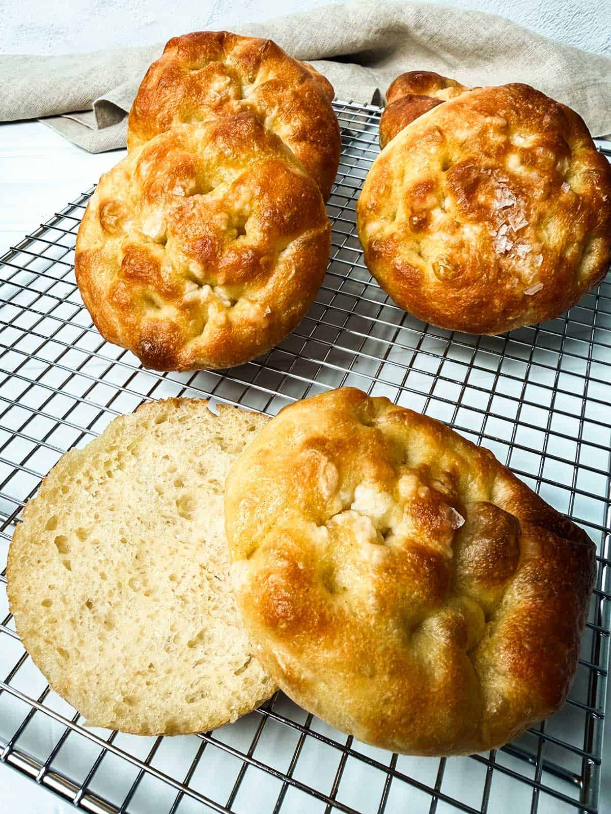 Buns on a wire rack.
