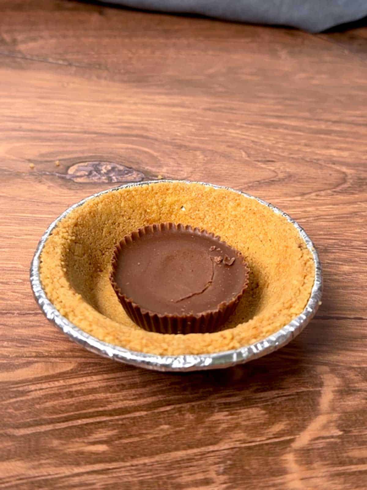 Reeses Peanut Butter Cup in Graham Cracker Crust.