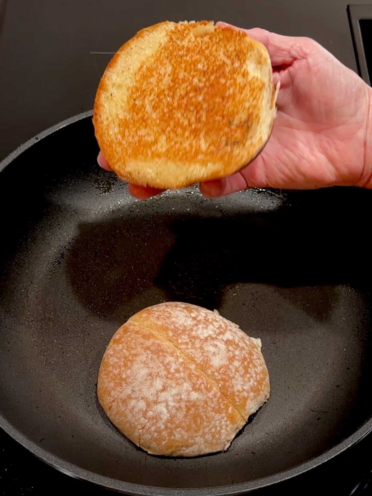 Bun toasted in the pan.