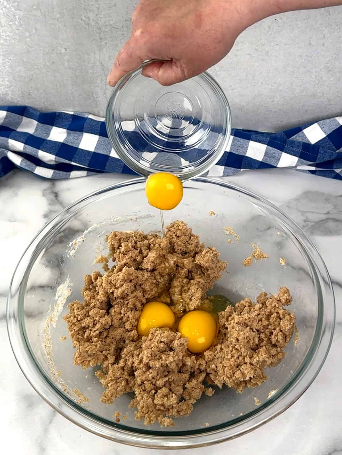 adding eggs and vanilla
