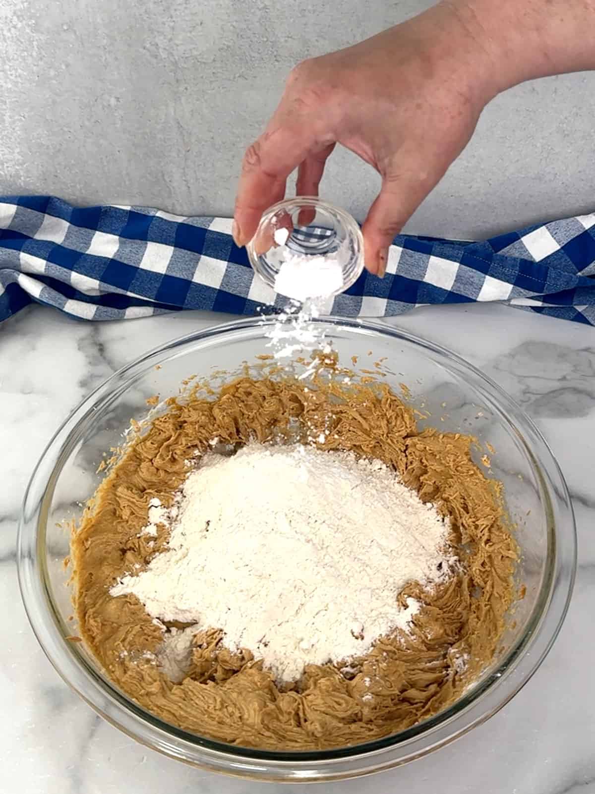 adding flour and baking soda
