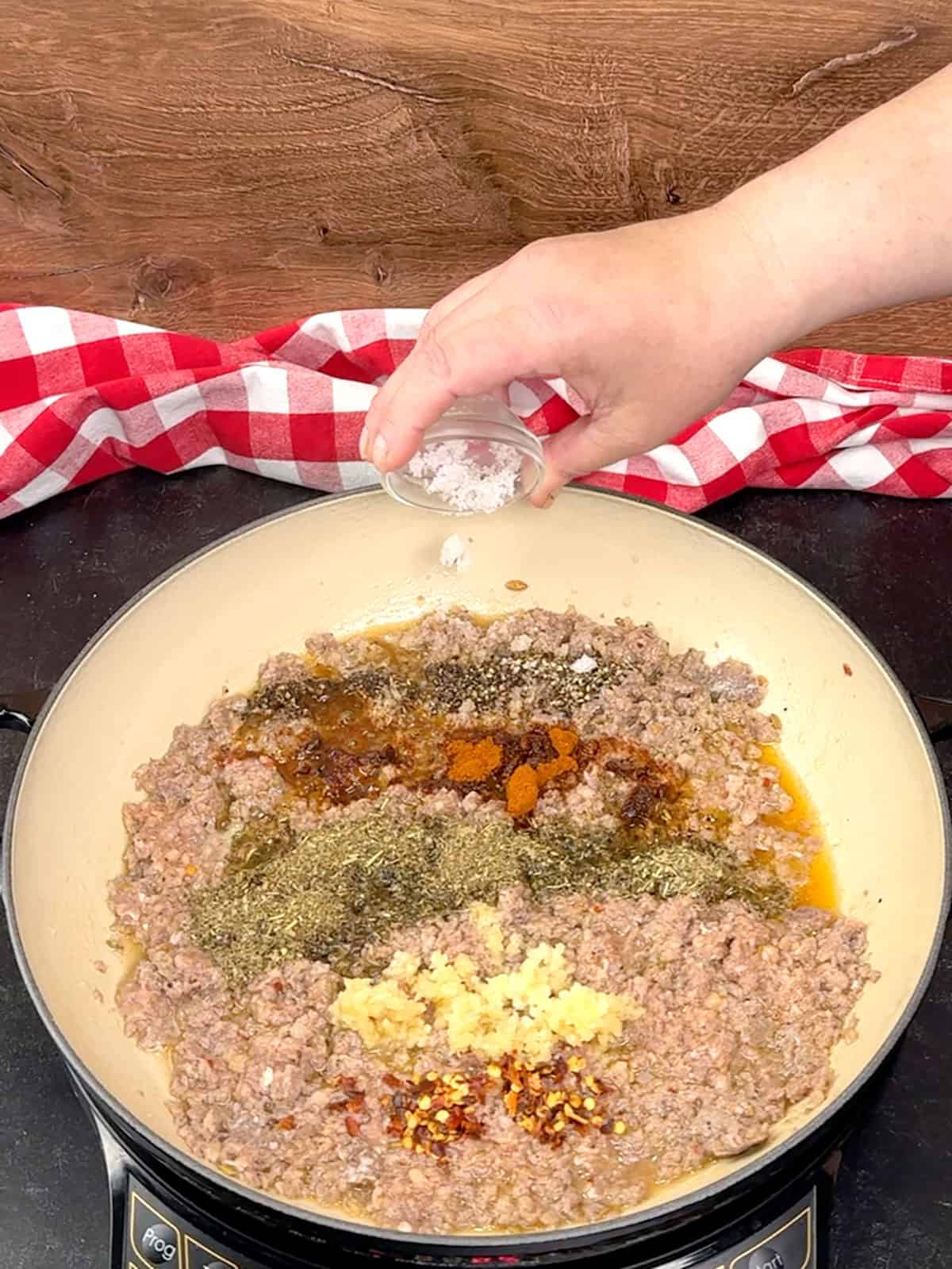 adding herbs and spices