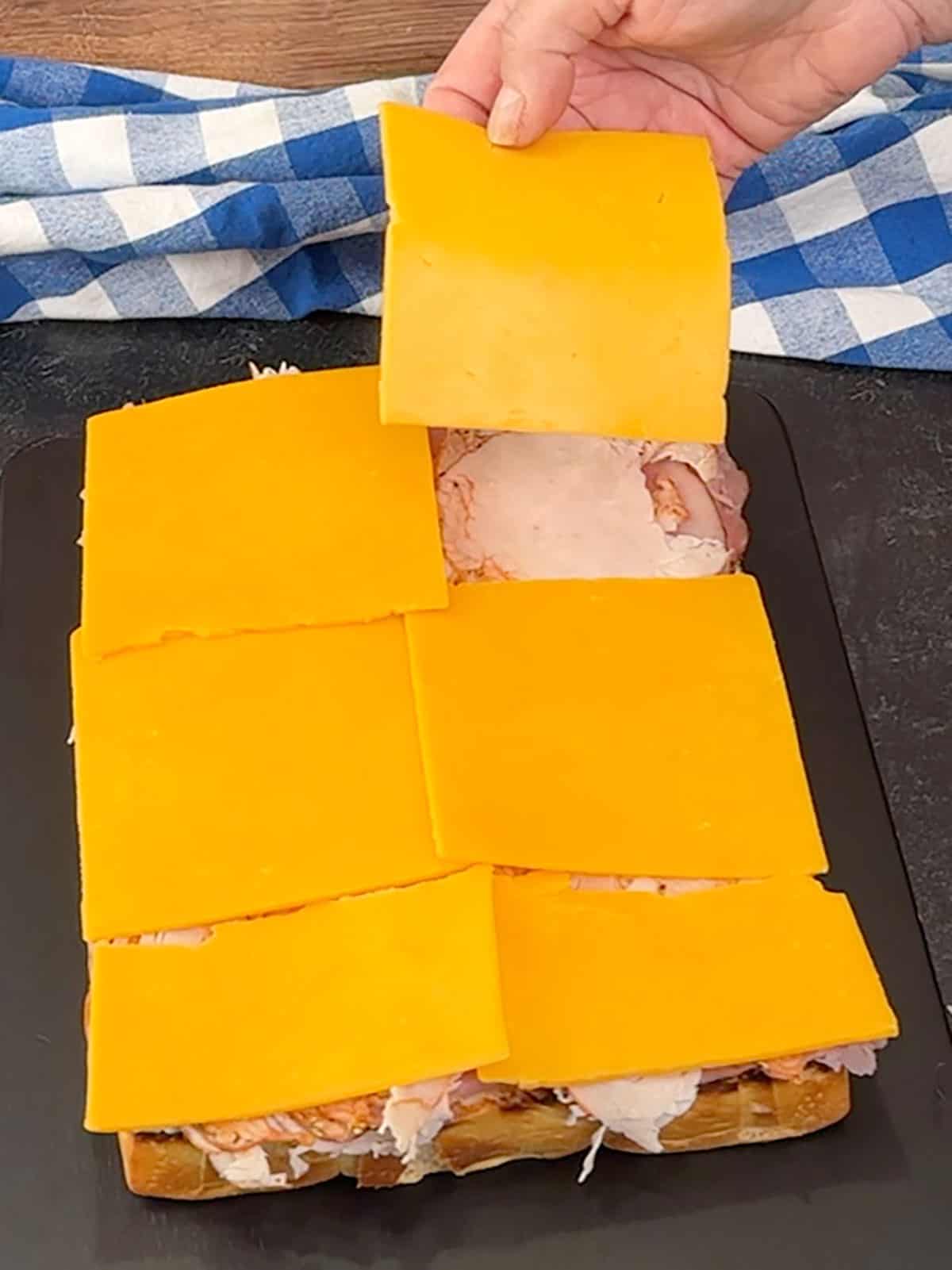 placing cheddar on top of turkey