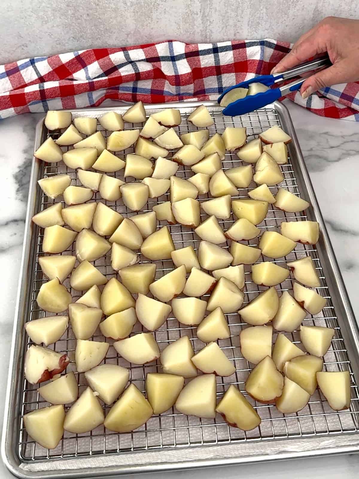 cooling potatoes on wire rack in sheet pan