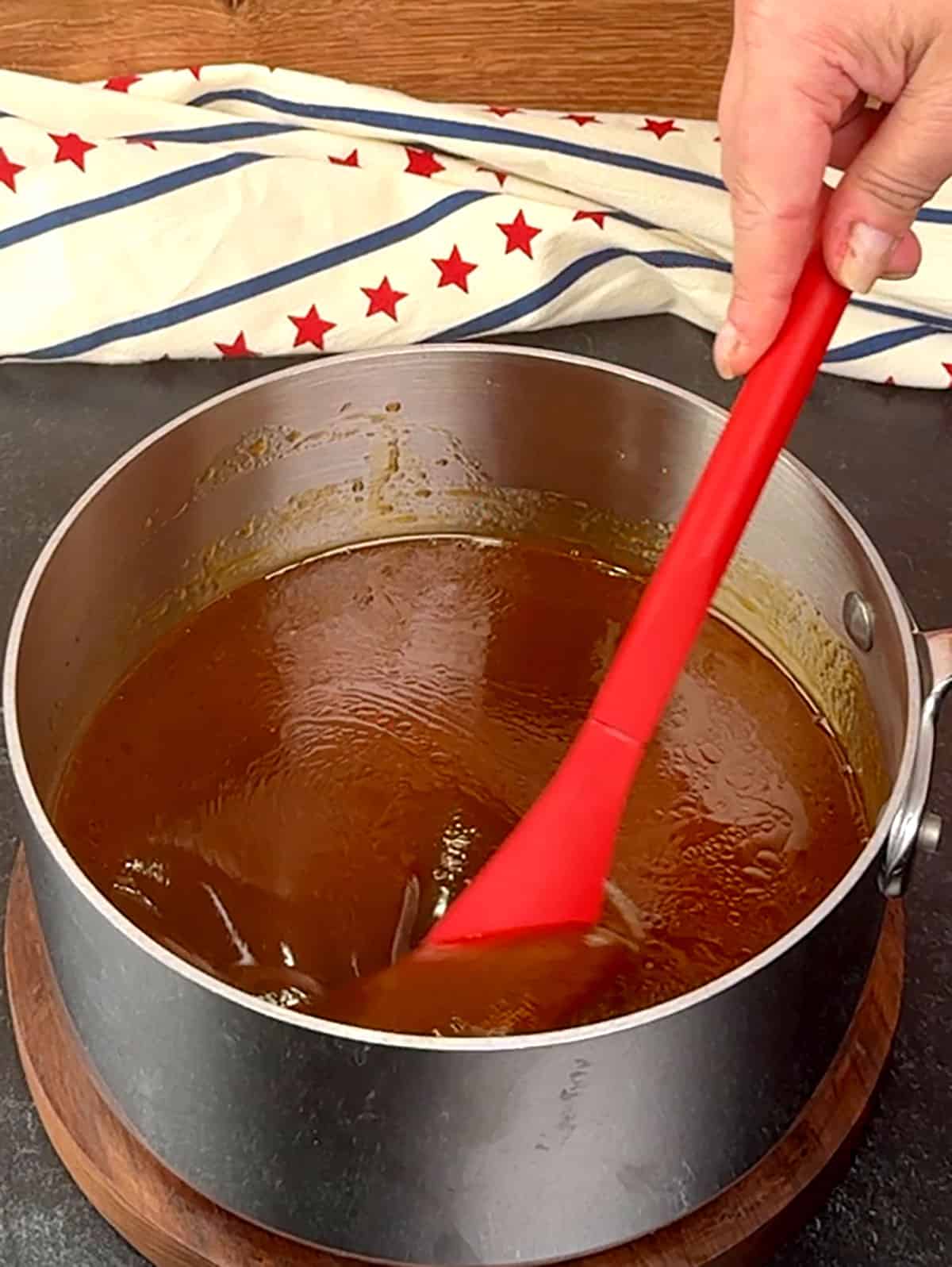 reducing sauce in pot