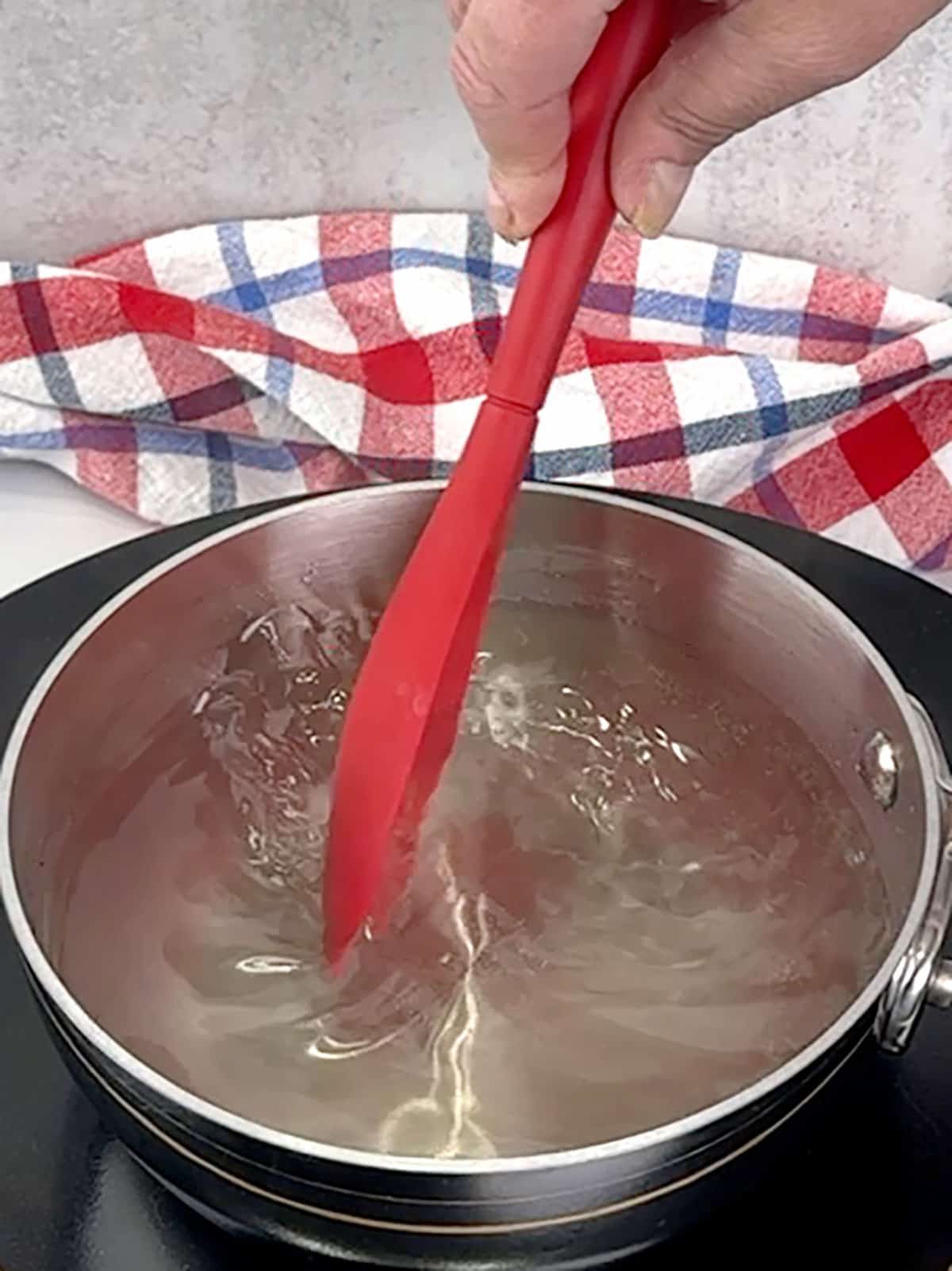stirring simple syrup