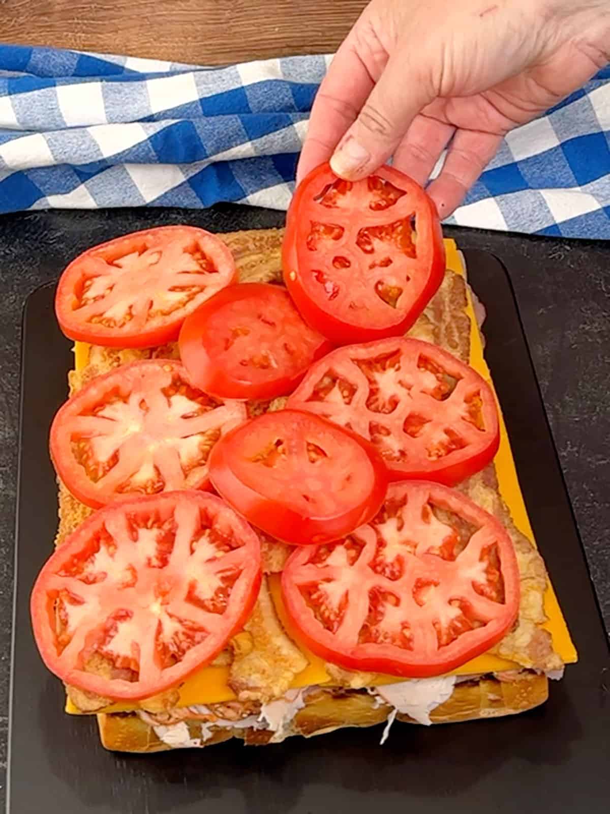 adding tomatoes