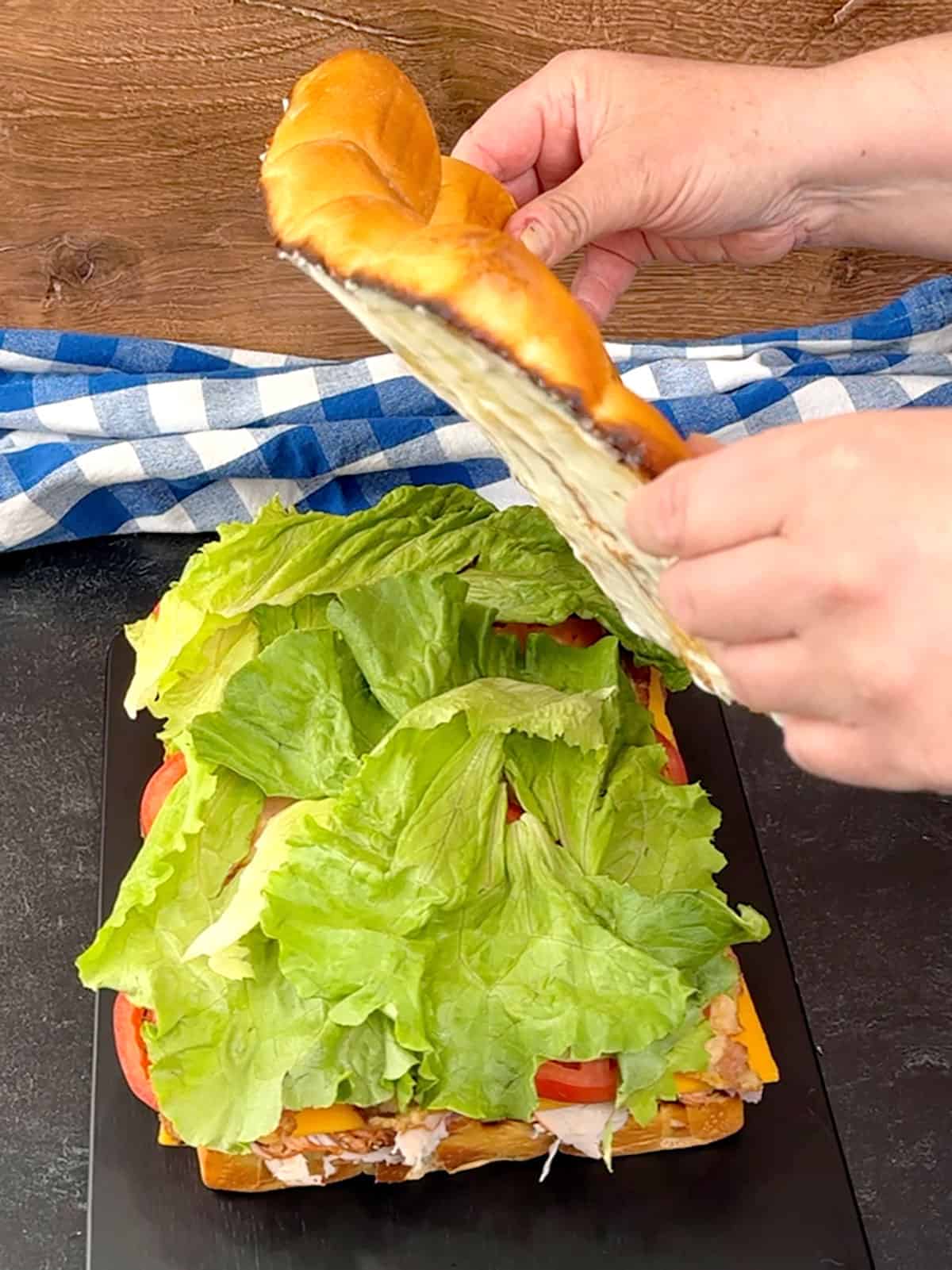 placing top buns