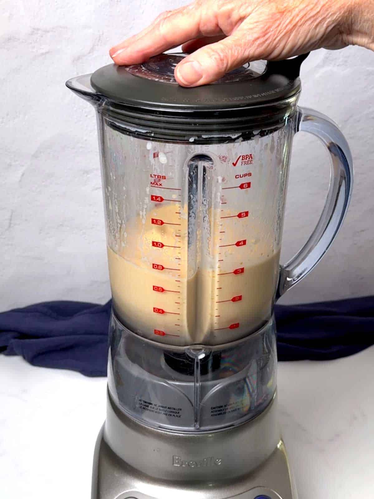 Blending the ingredients in the blender.