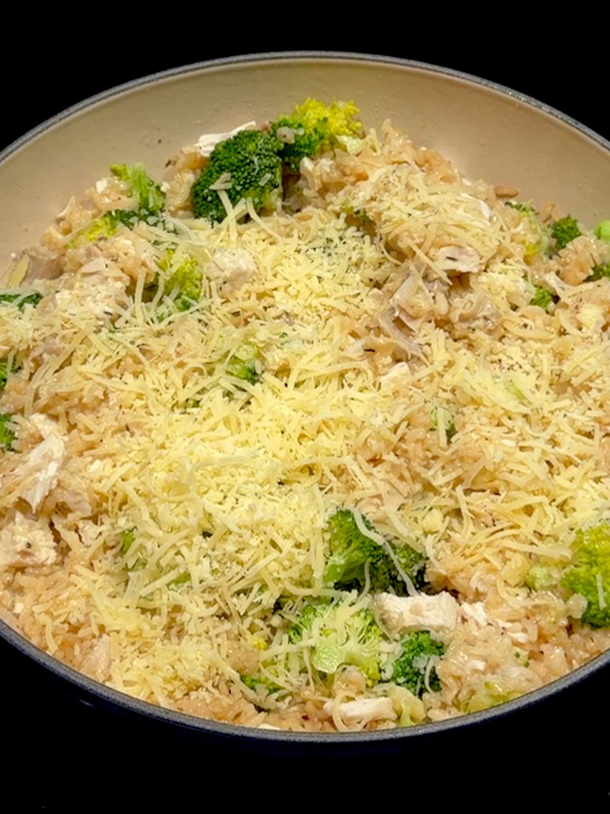 Gruyère sprinkled on top of the mixture.