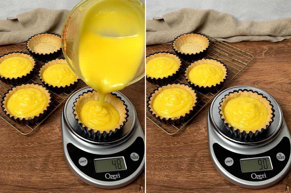 Filling the pastry shells with lemon curd.