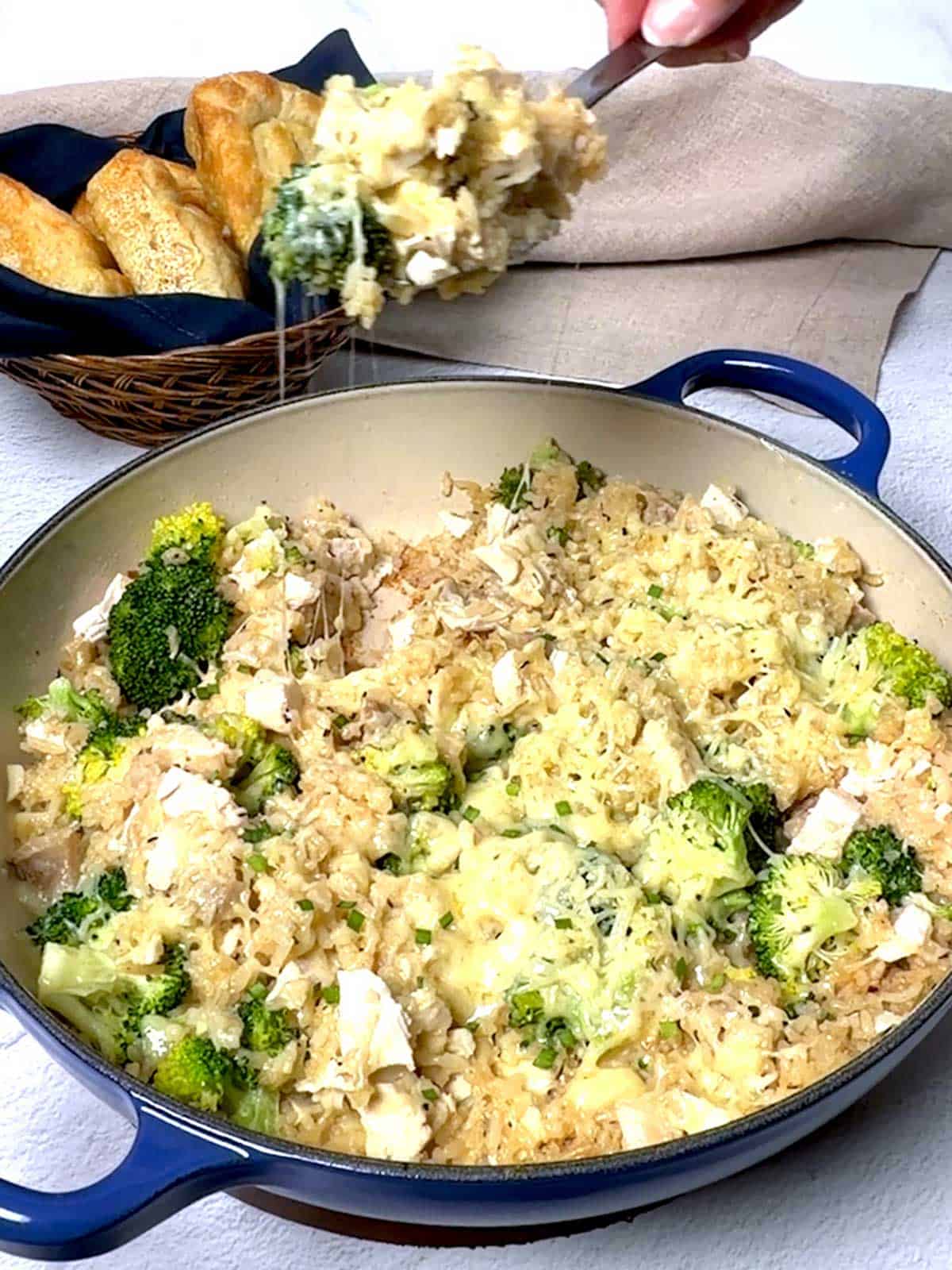 One-pan chicken and rice skillet with broccoli and Gruyère cheese.