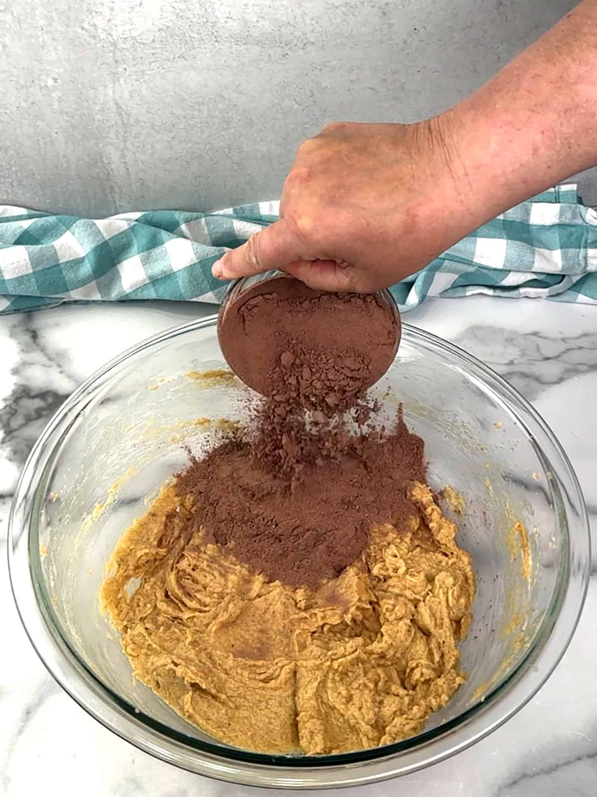 adding flour mixture to wet ingredients