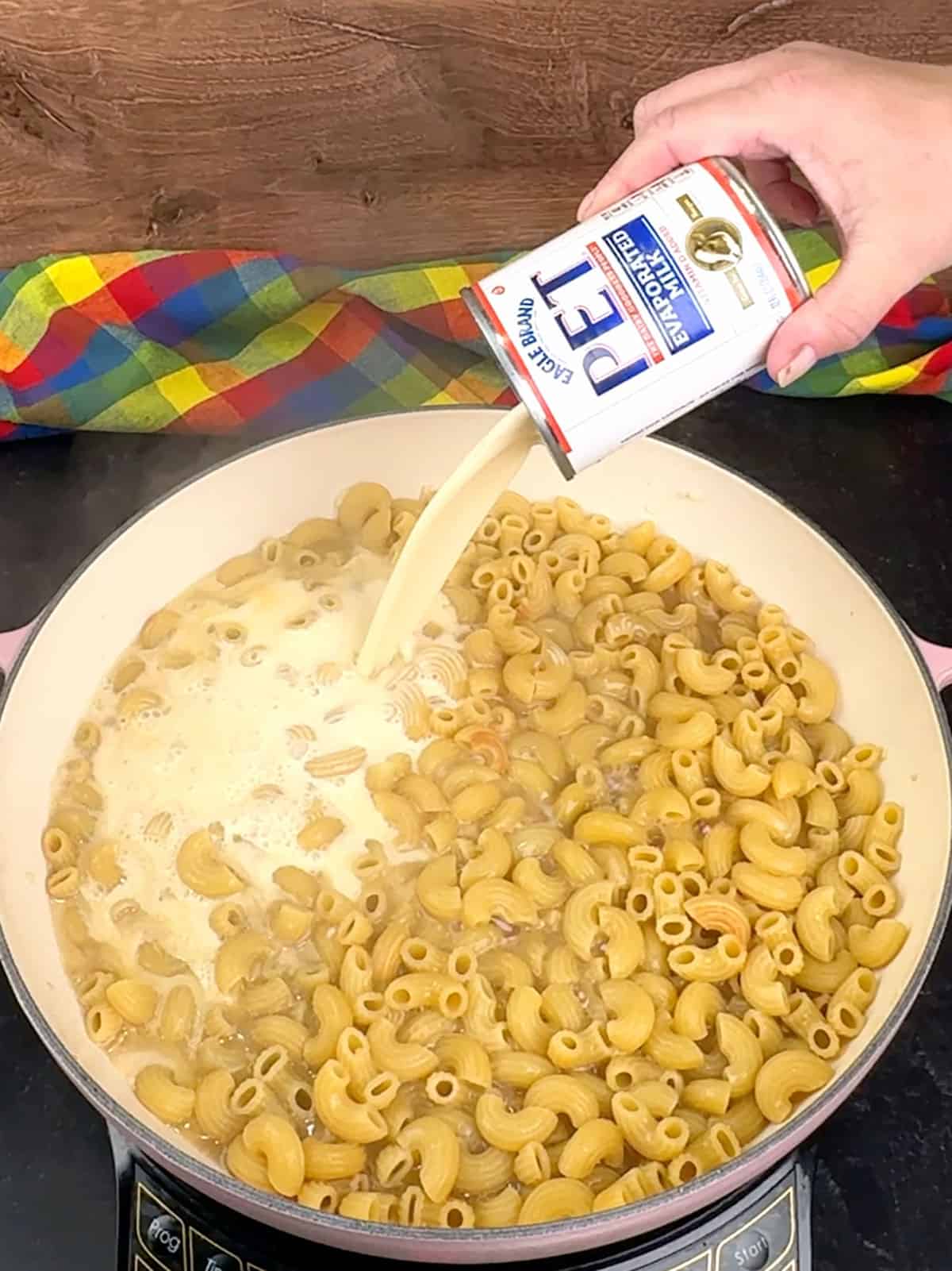 adding milk and spices