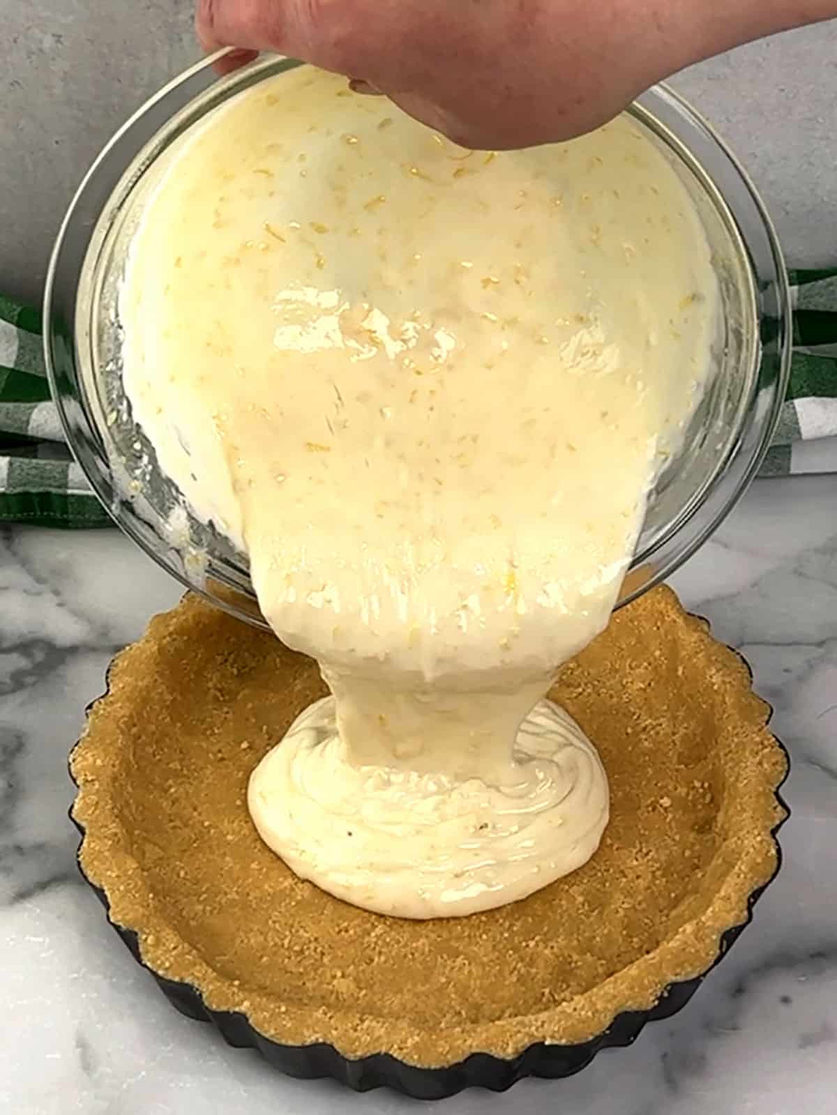 pouring filling into crust