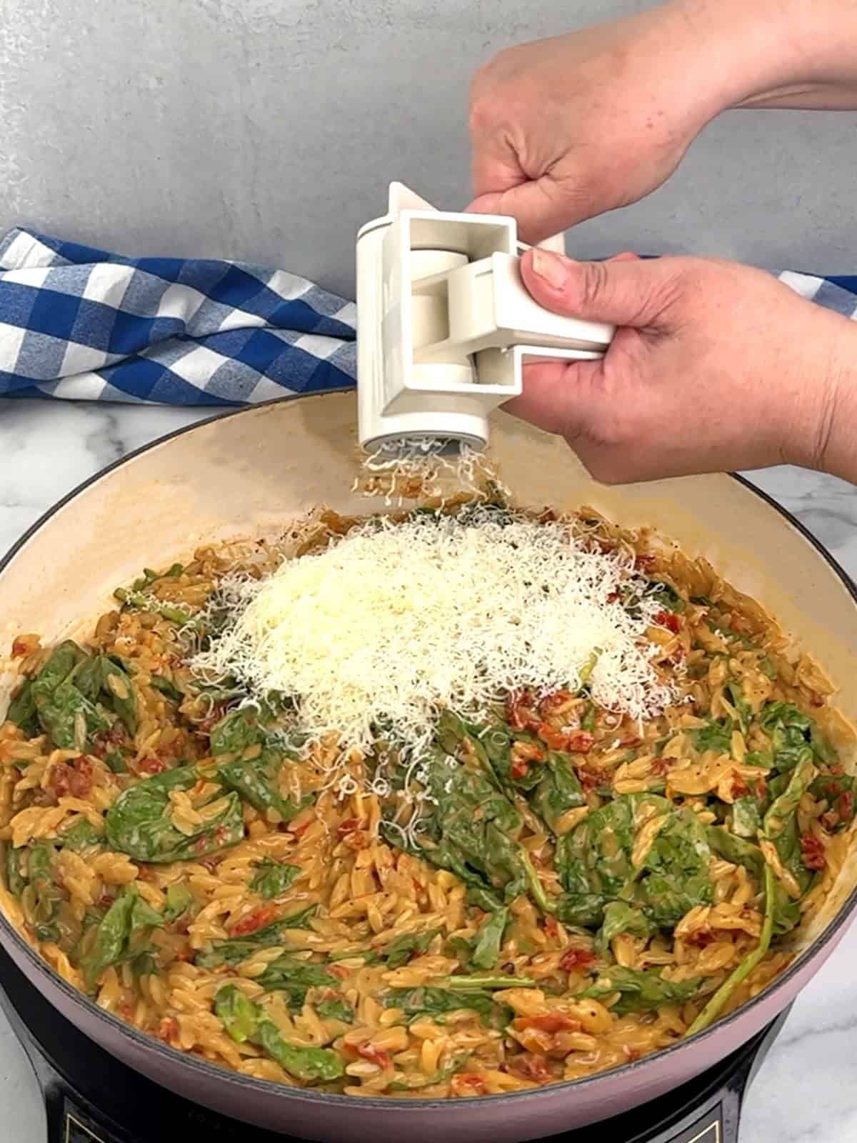 adding parmesan cheese