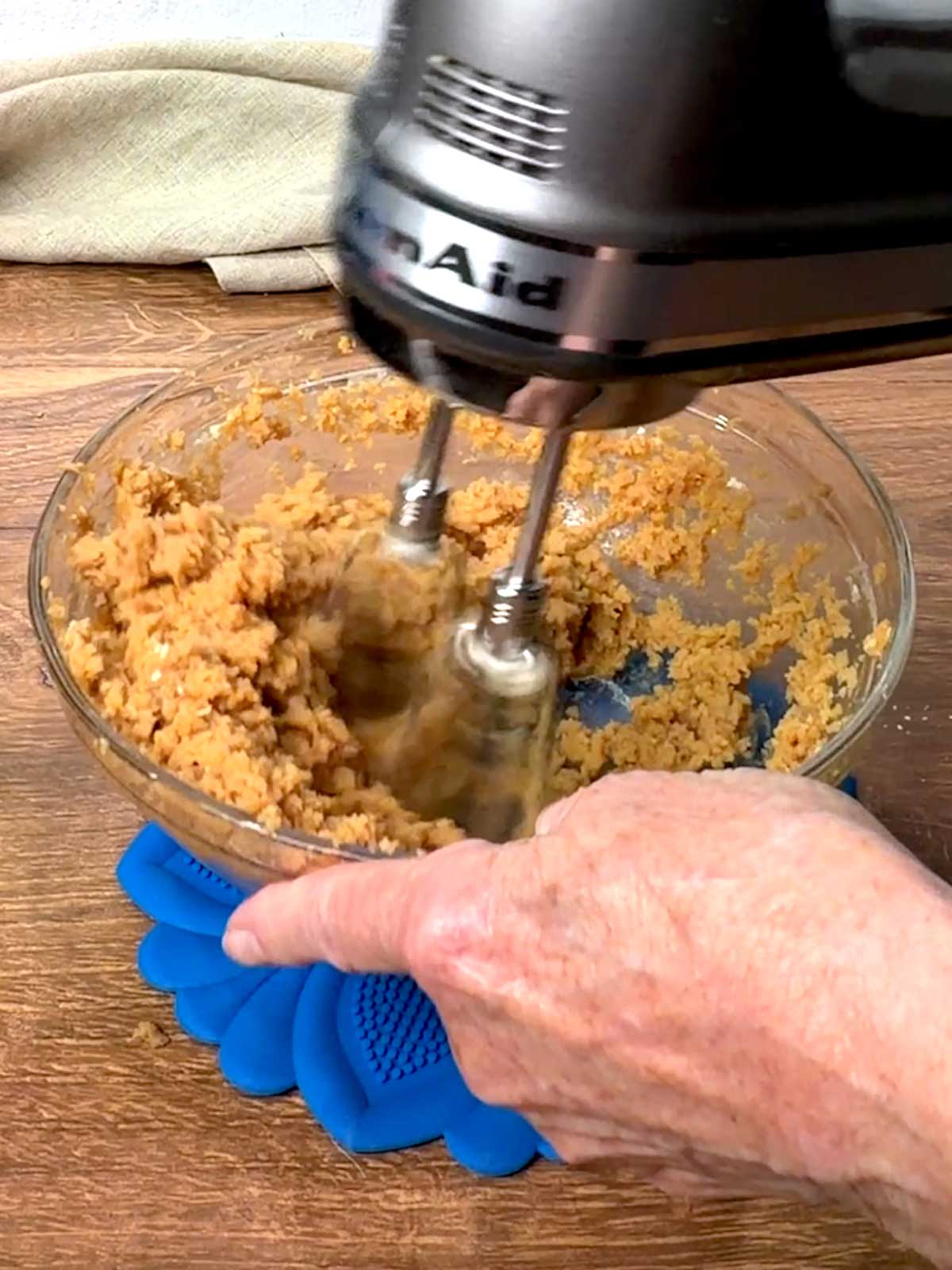 Beating peanut butter mixture.
