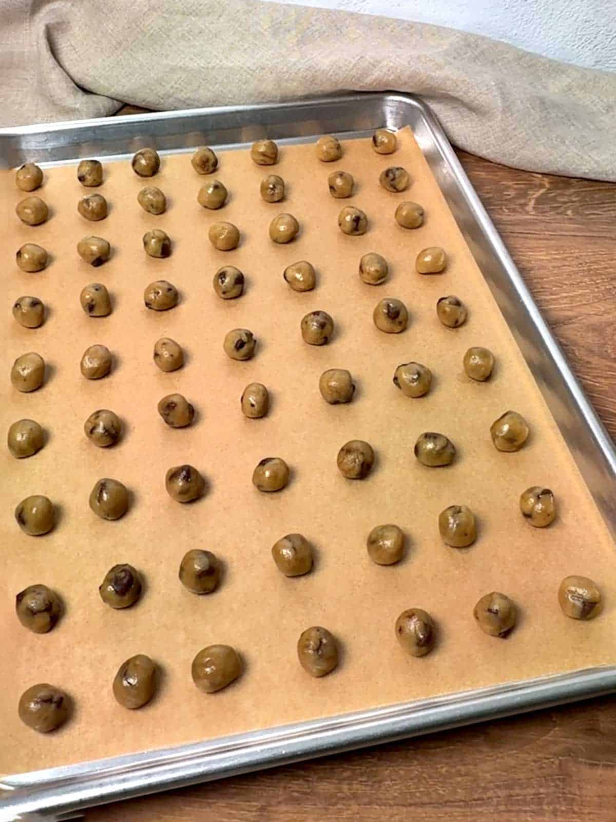 Cookie dough rolled into 4 gram balls.