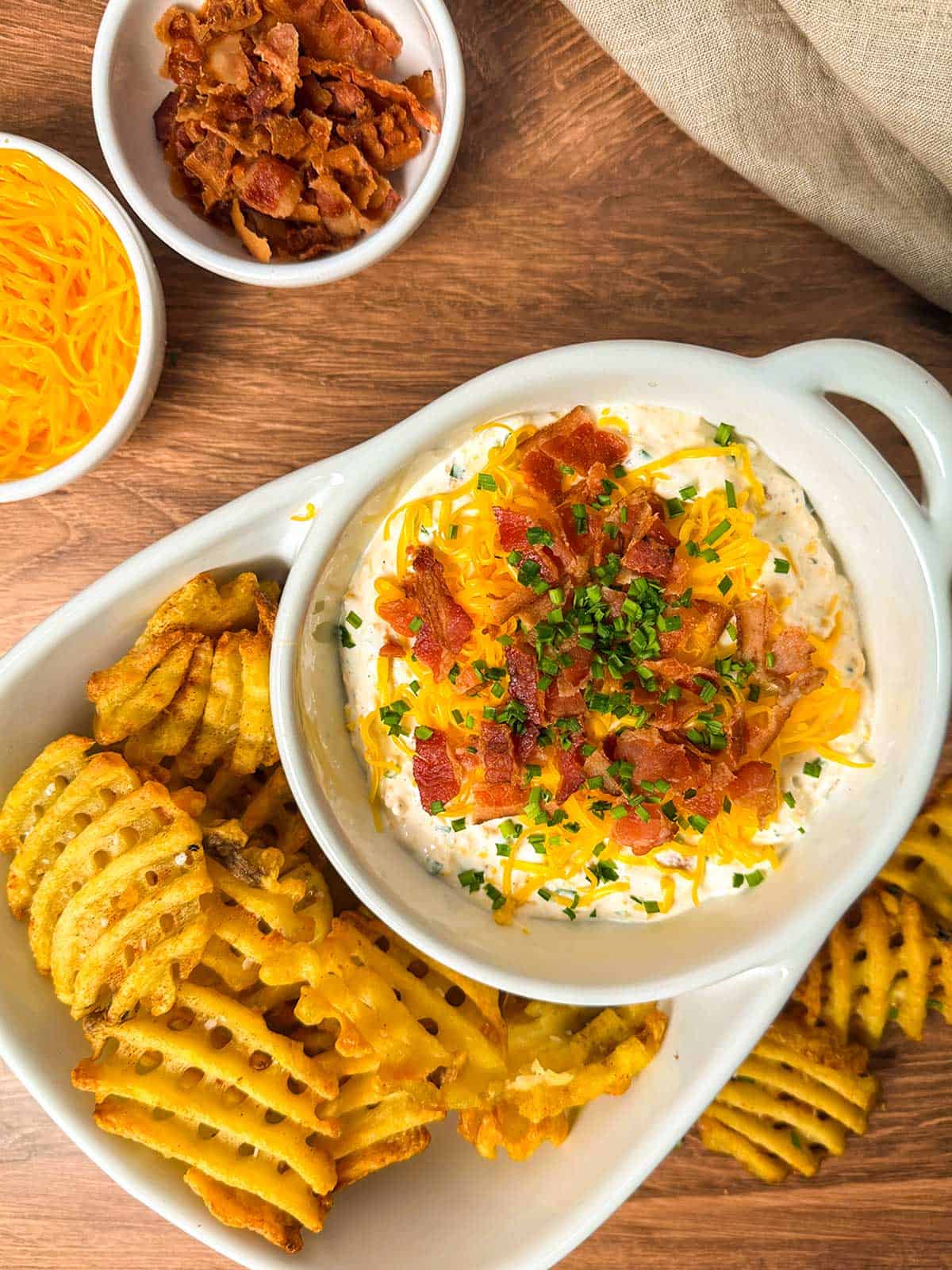Loaded Baked Potato Dip with waffle fries.