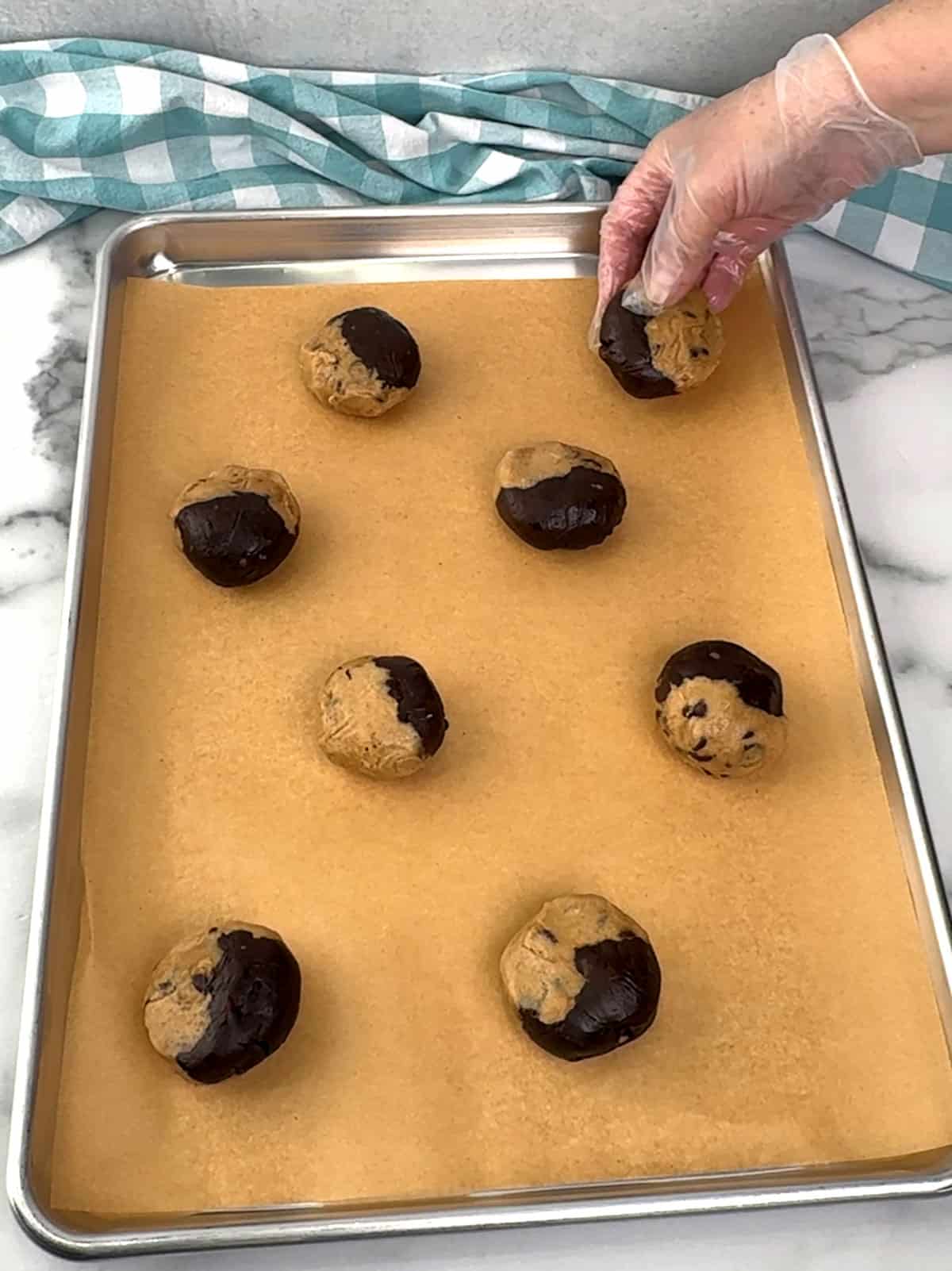 placing dough on prepared pan